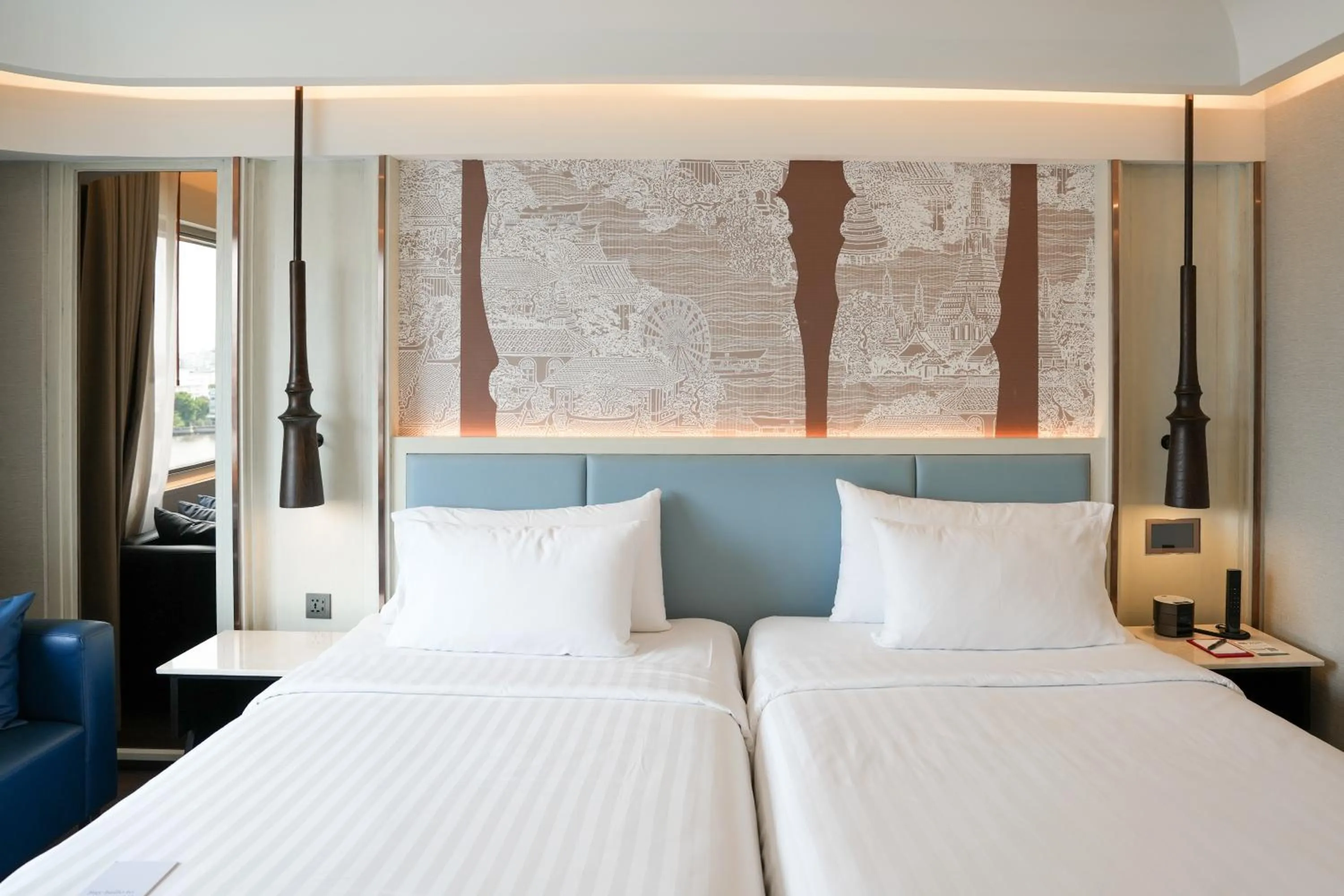 Bed in Ramada Plaza by Wyndham Bangkok Menam Riverside