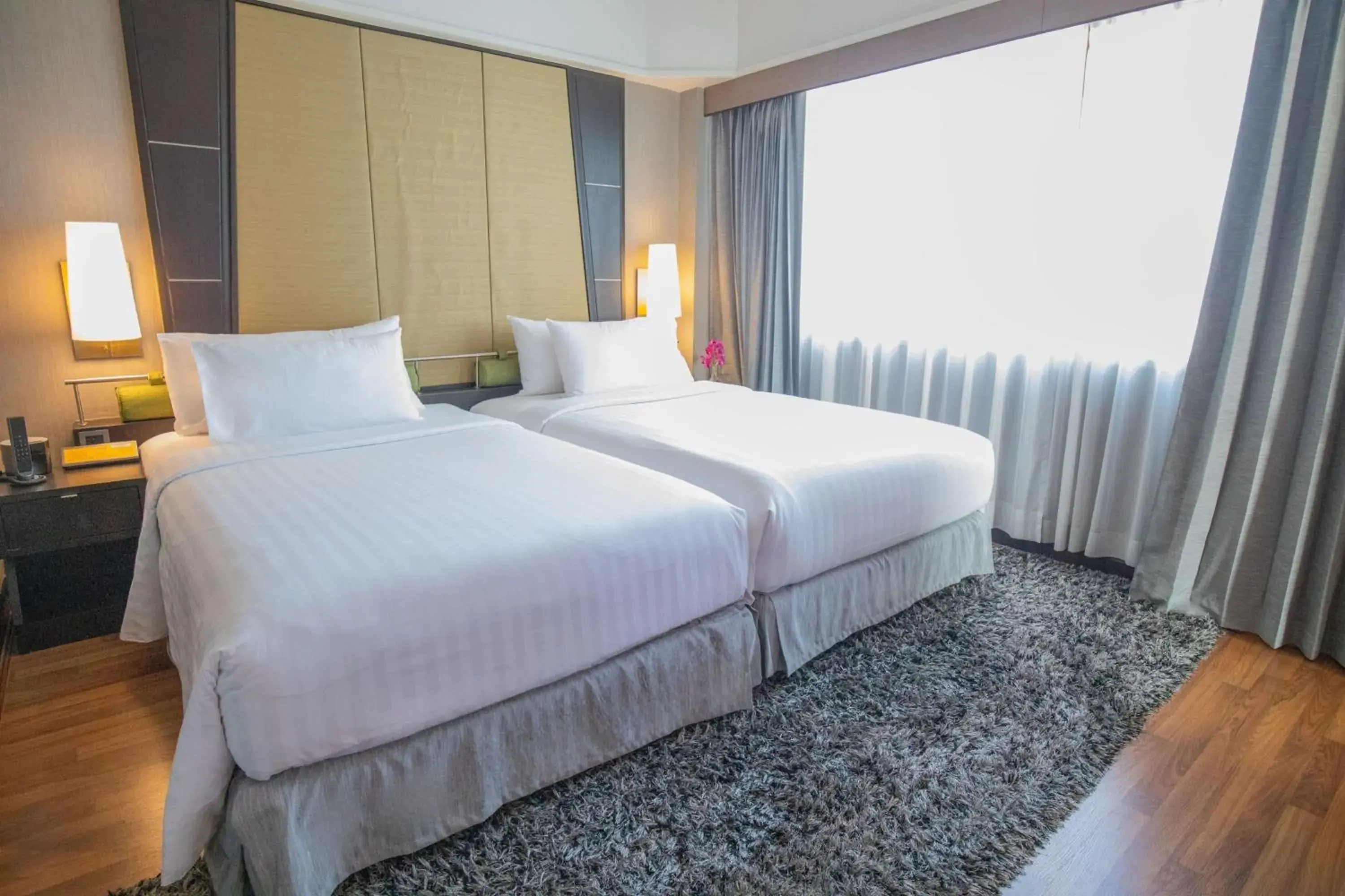 Bed in Ramada Plaza by Wyndham Bangkok Menam Riverside Bed in Ramada Plaza by Wyndham Bangkok Menam Riverside