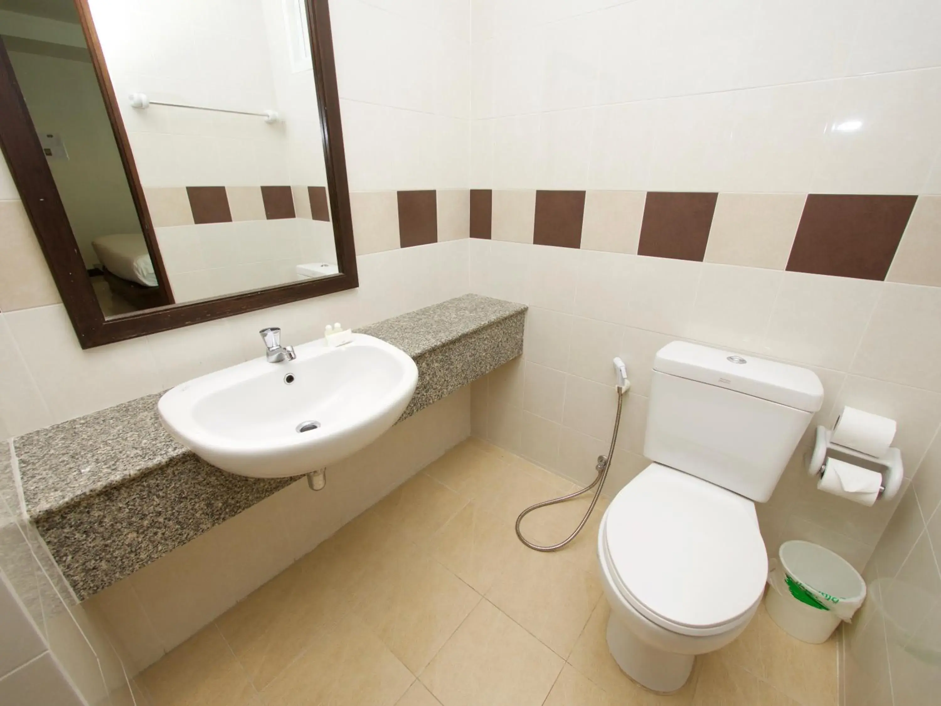 Bathroom in Q Victory Patong Hotel Bathroom in Q Victory Patong Hotel