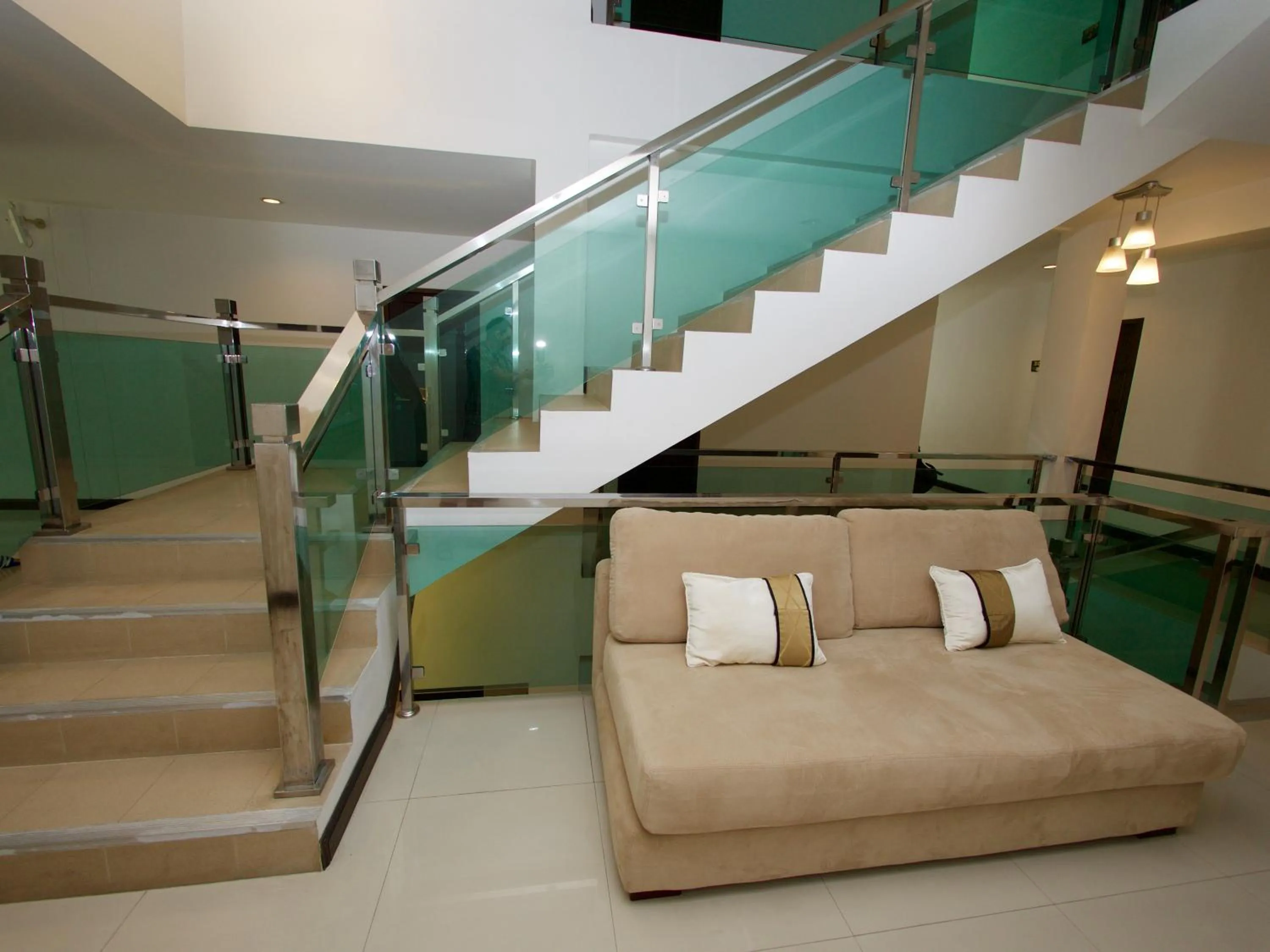 Seating area in Q Victory Patong Hotel