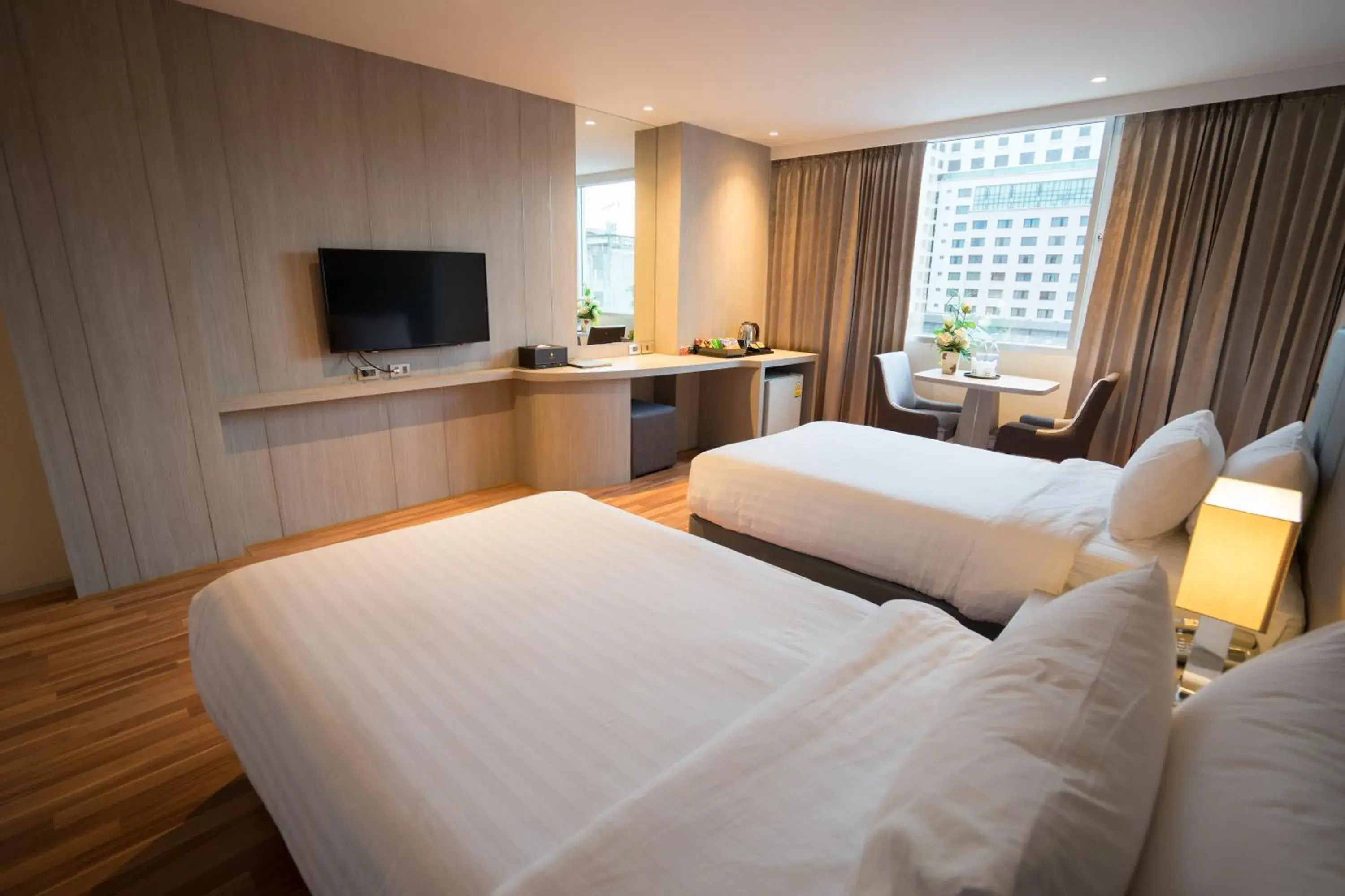 Bedroom in New Season Square Hotel Bedroom in New Season Square Hotel