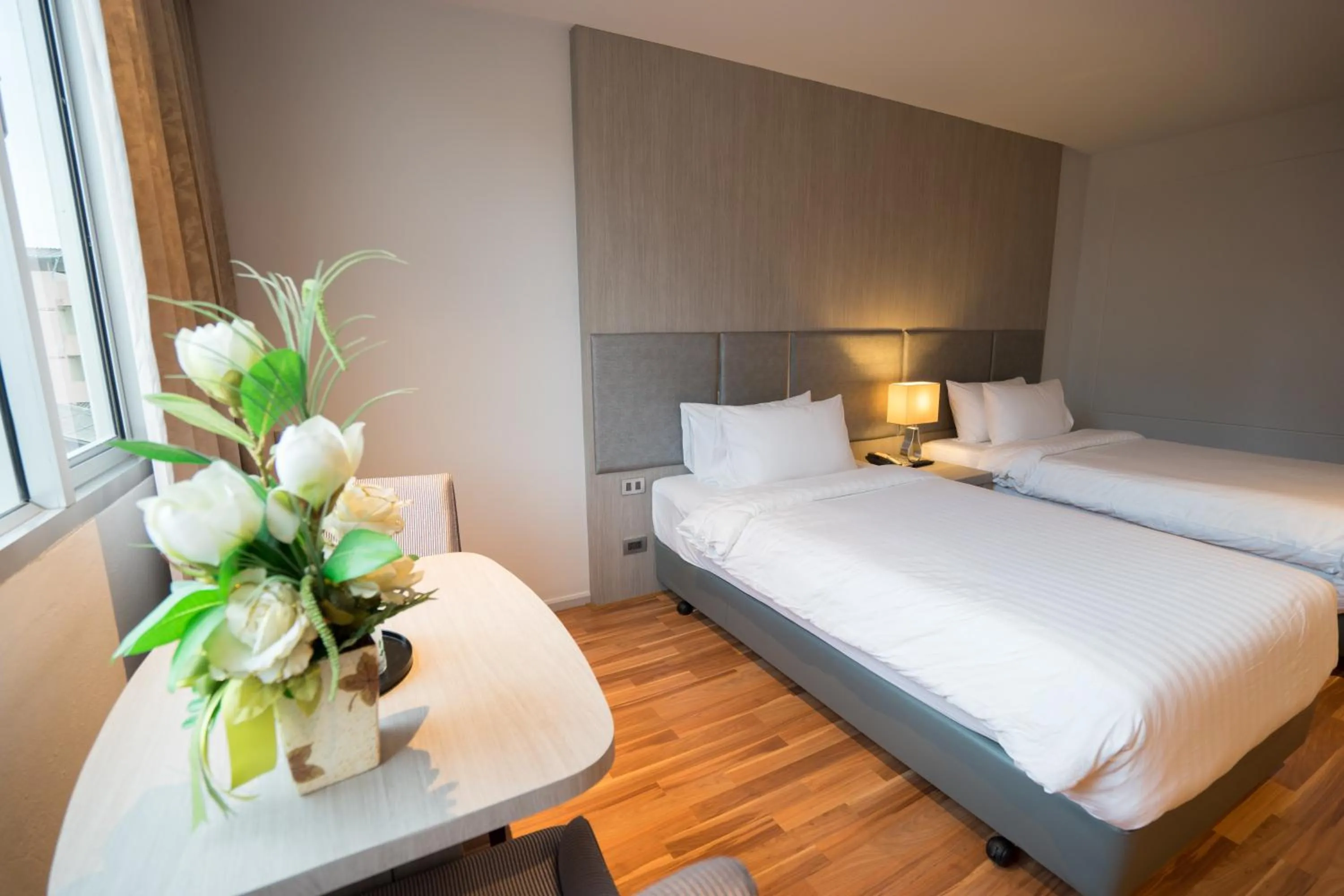 Bedroom in New Season Square Hotel