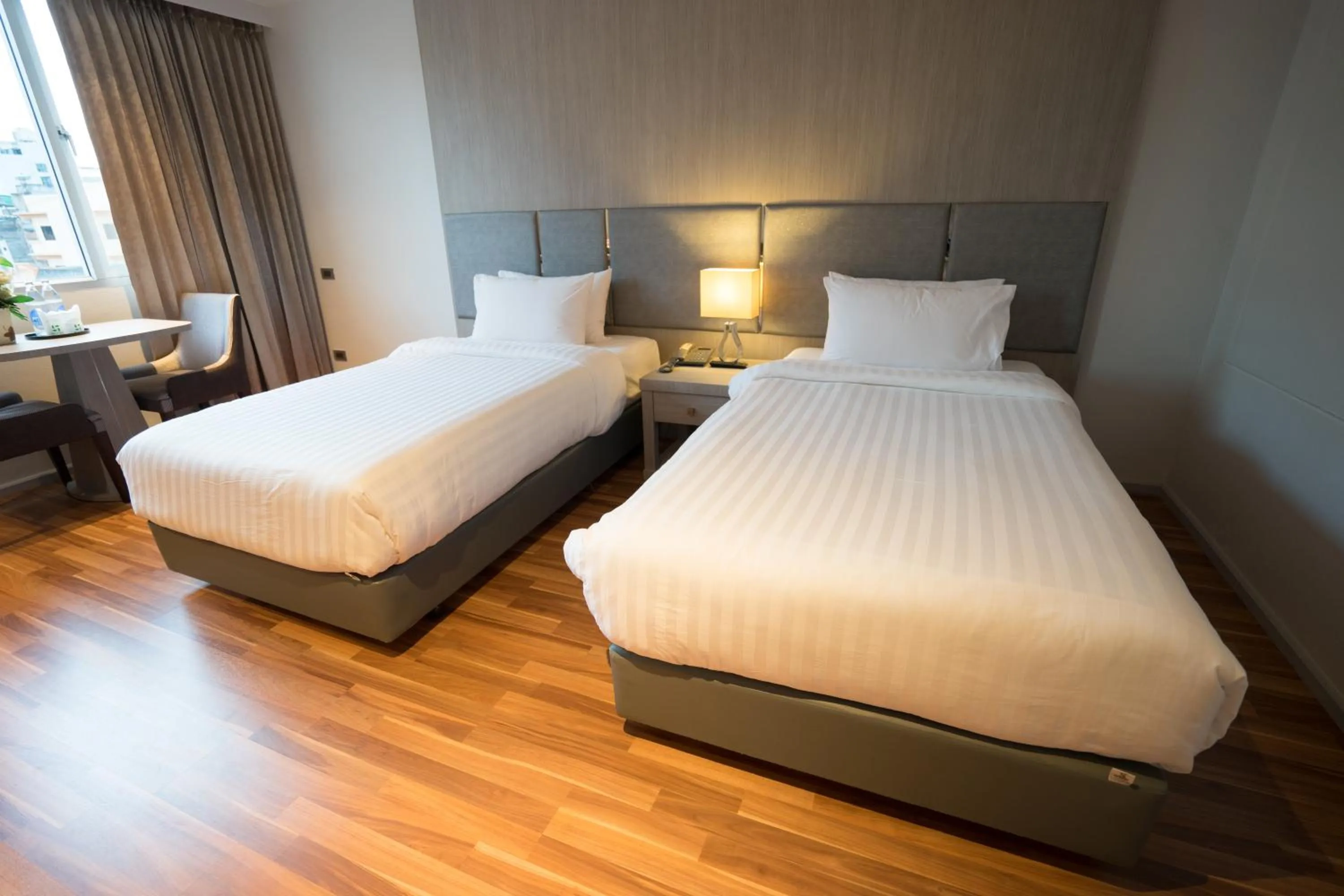 Bedroom in New Season Square Hotel