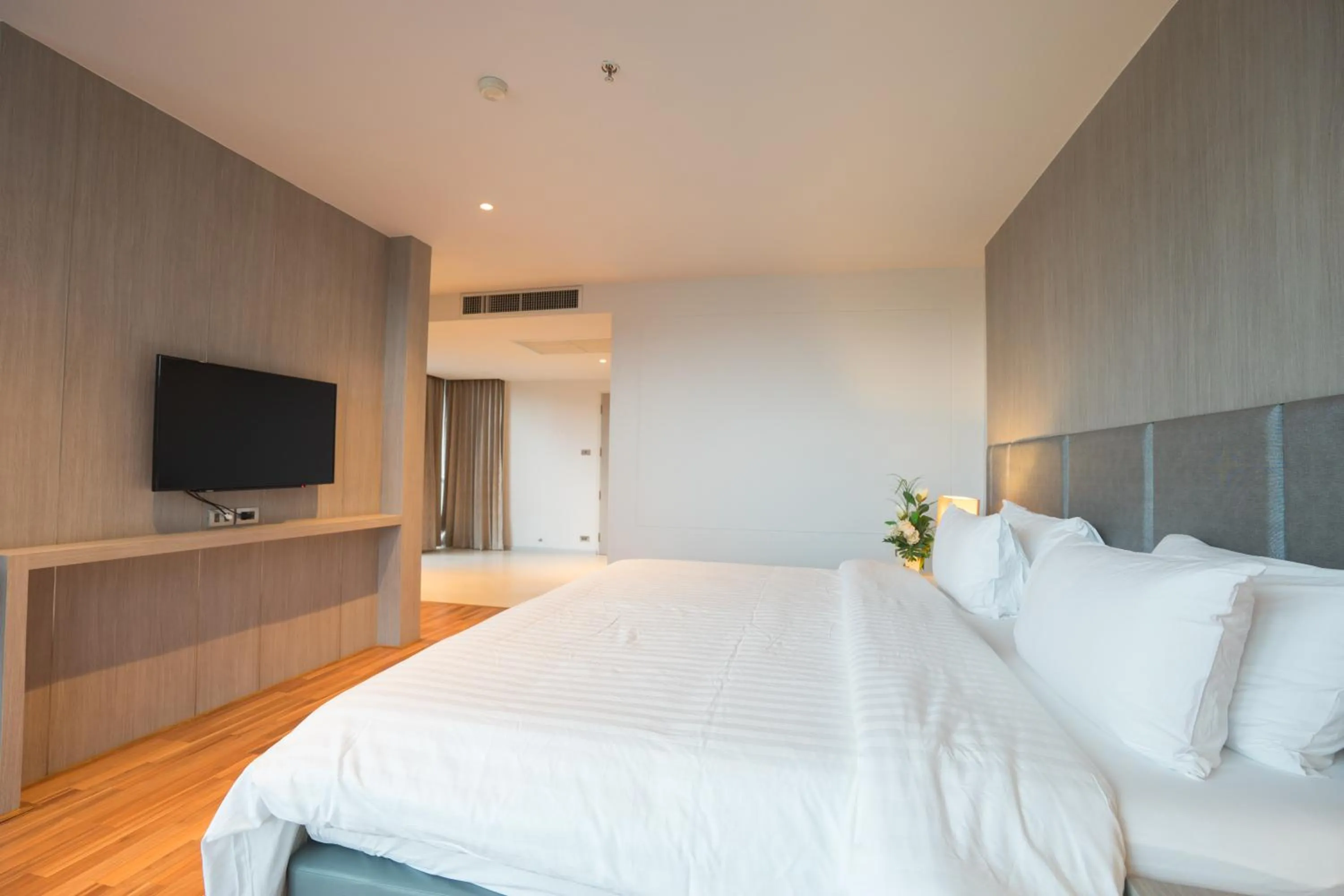 Bedroom in New Season Square Hotel