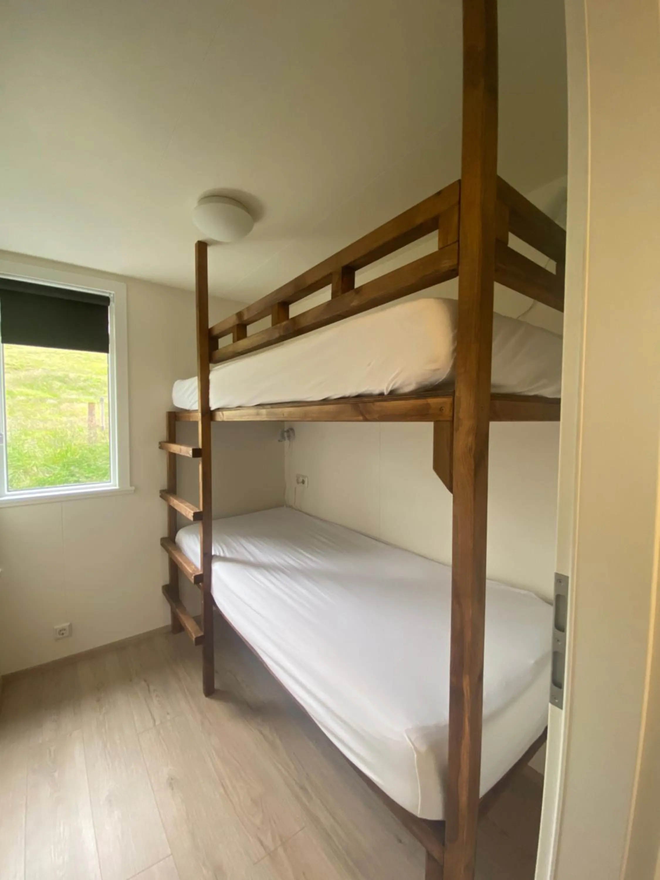 Bed in Vallakot Farm Guesthouse