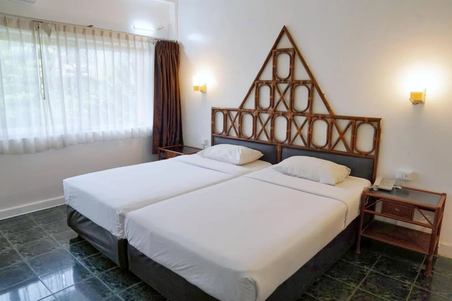 Bed in Basaya Beach Hotel & Resort