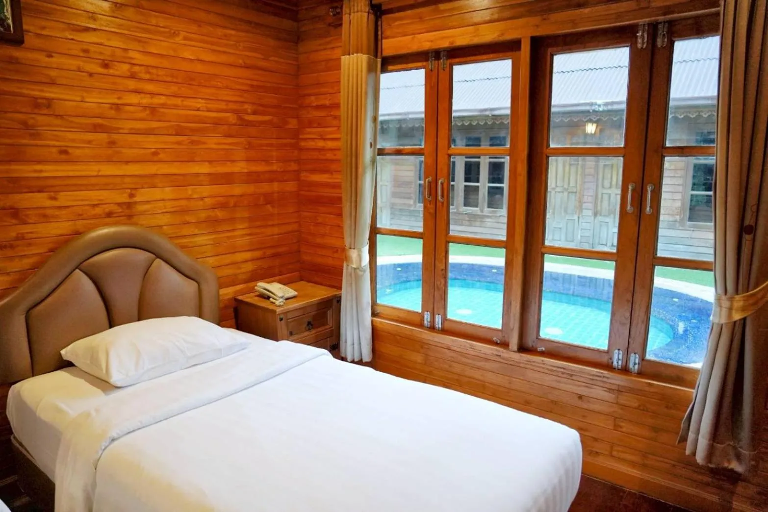 Bed in Basaya Beach Hotel & Resort
