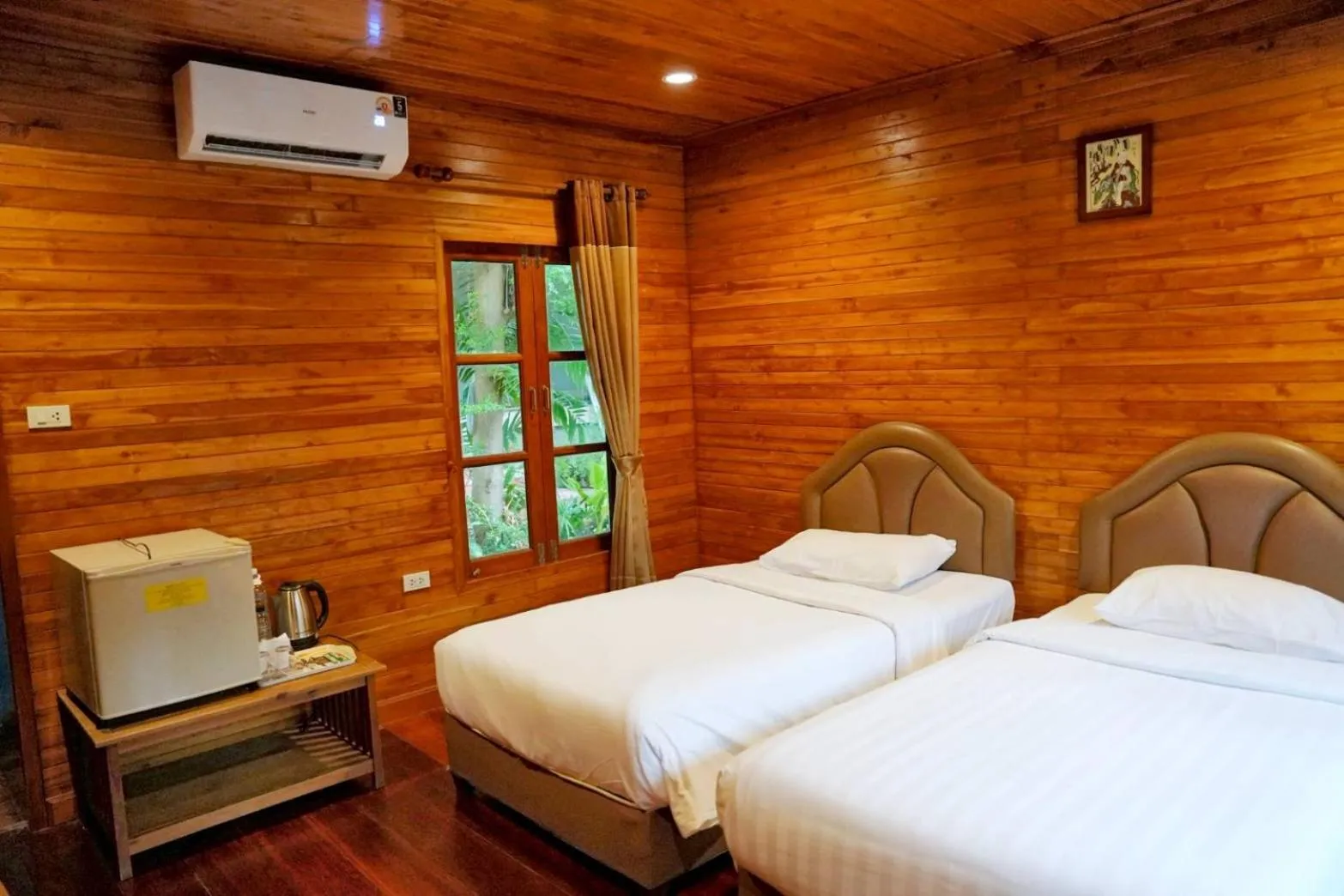 Bed in Basaya Beach Hotel & Resort