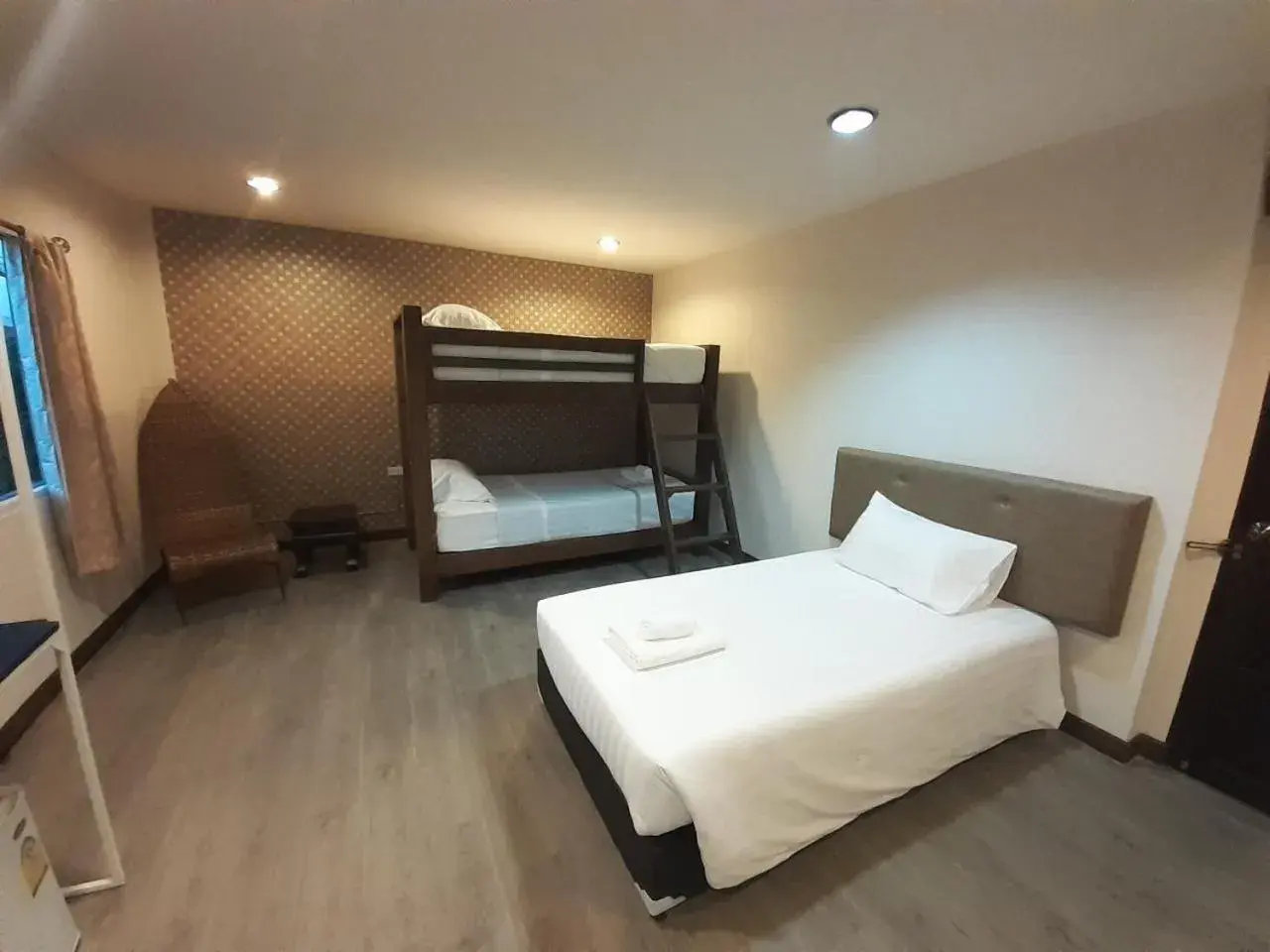 Photo of the whole room, Bed in Parasol Inn Chiang Mai Old City Photo of the whole room, Bed in Parasol Inn Chiang Mai Old City