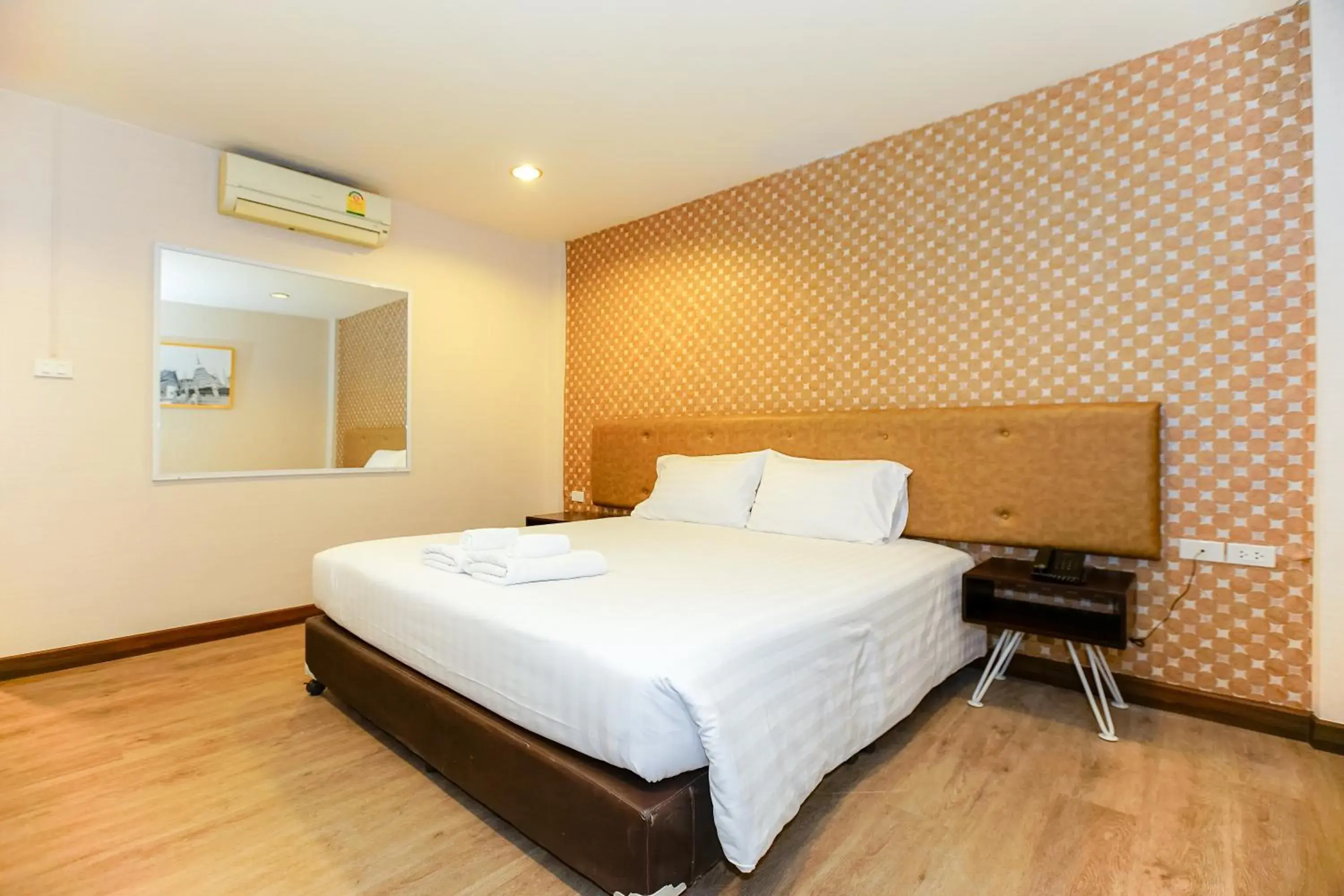 Bed in Parasol Inn Chiang Mai Old City Bed in Parasol Inn Chiang Mai Old City