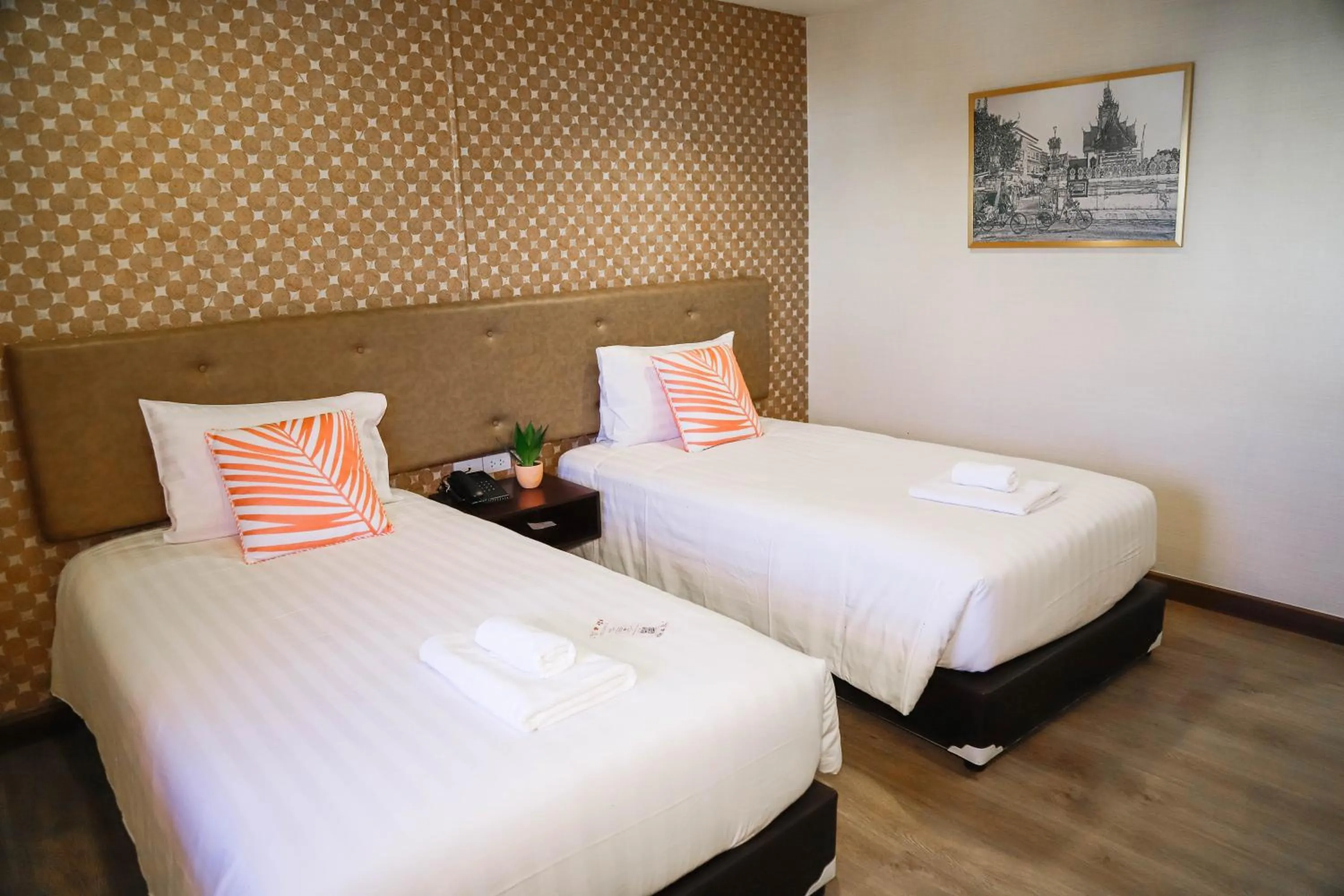 Bed in Parasol Inn Chiang Mai Old City