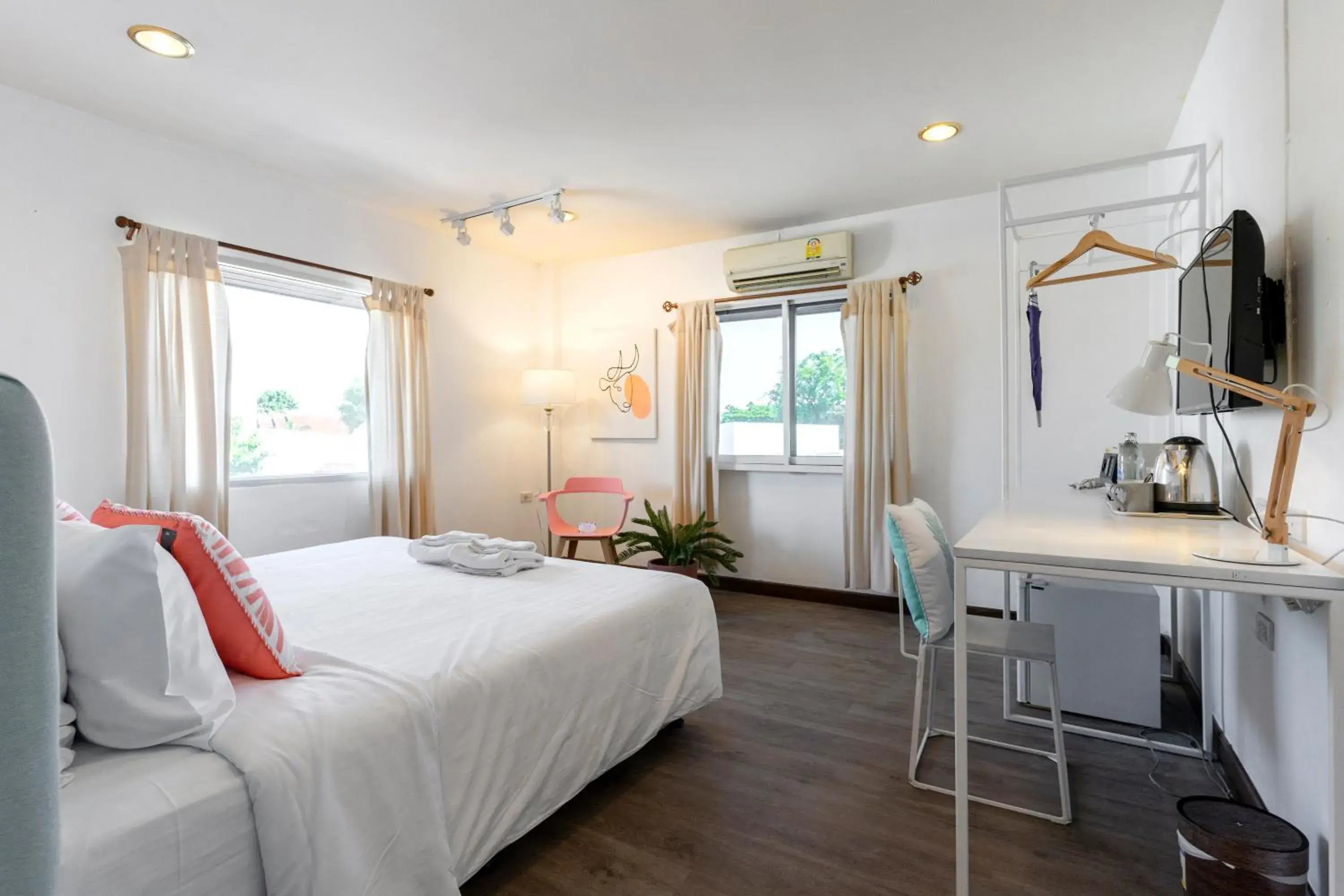 Decorative detail, Bed in Parasol Inn Chiang Mai Old City Decorative detail, Bed in Parasol Inn Chiang Mai Old City