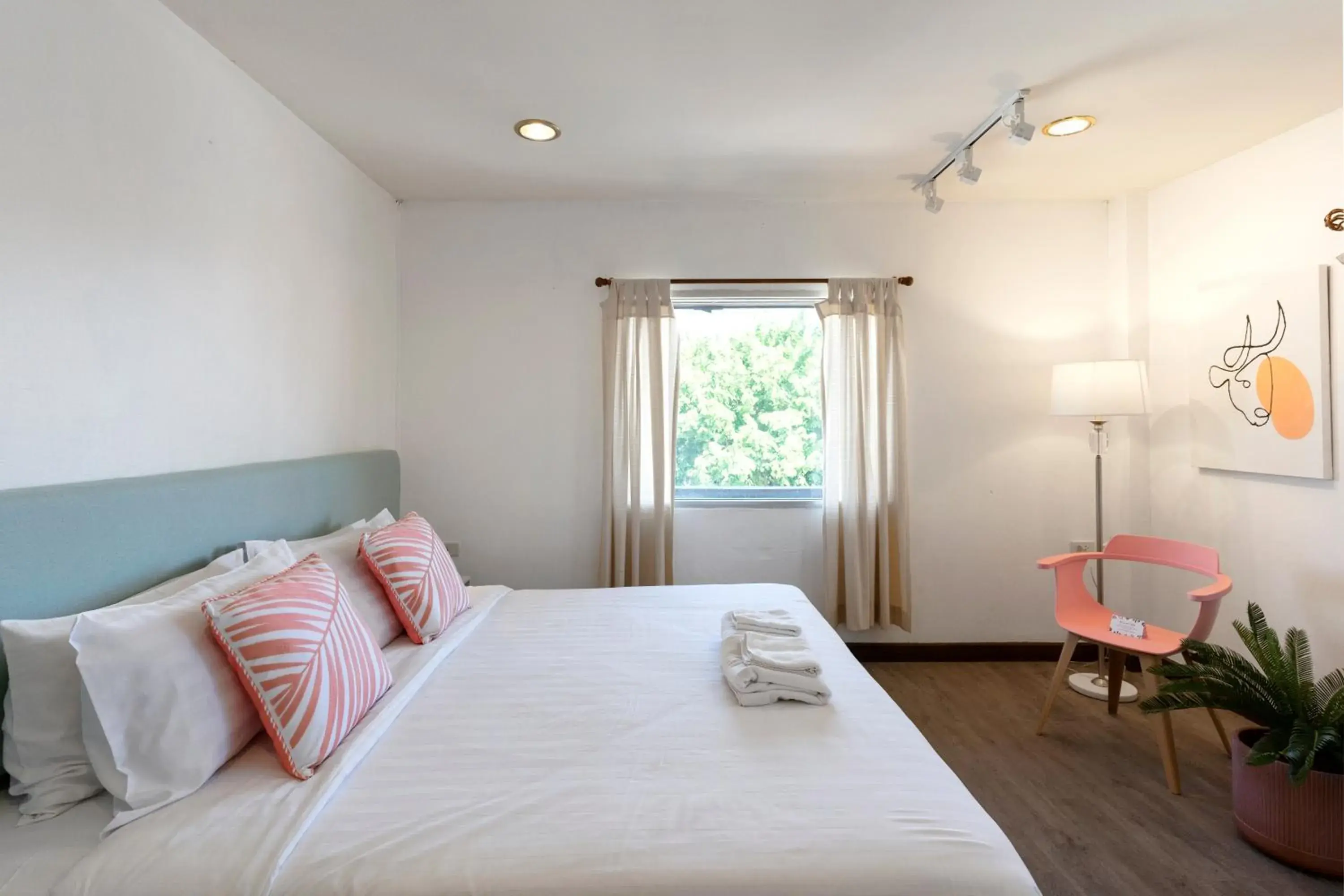 Decorative detail, Bed in Parasol Inn Chiang Mai Old City Decorative detail, Bed in Parasol Inn Chiang Mai Old City