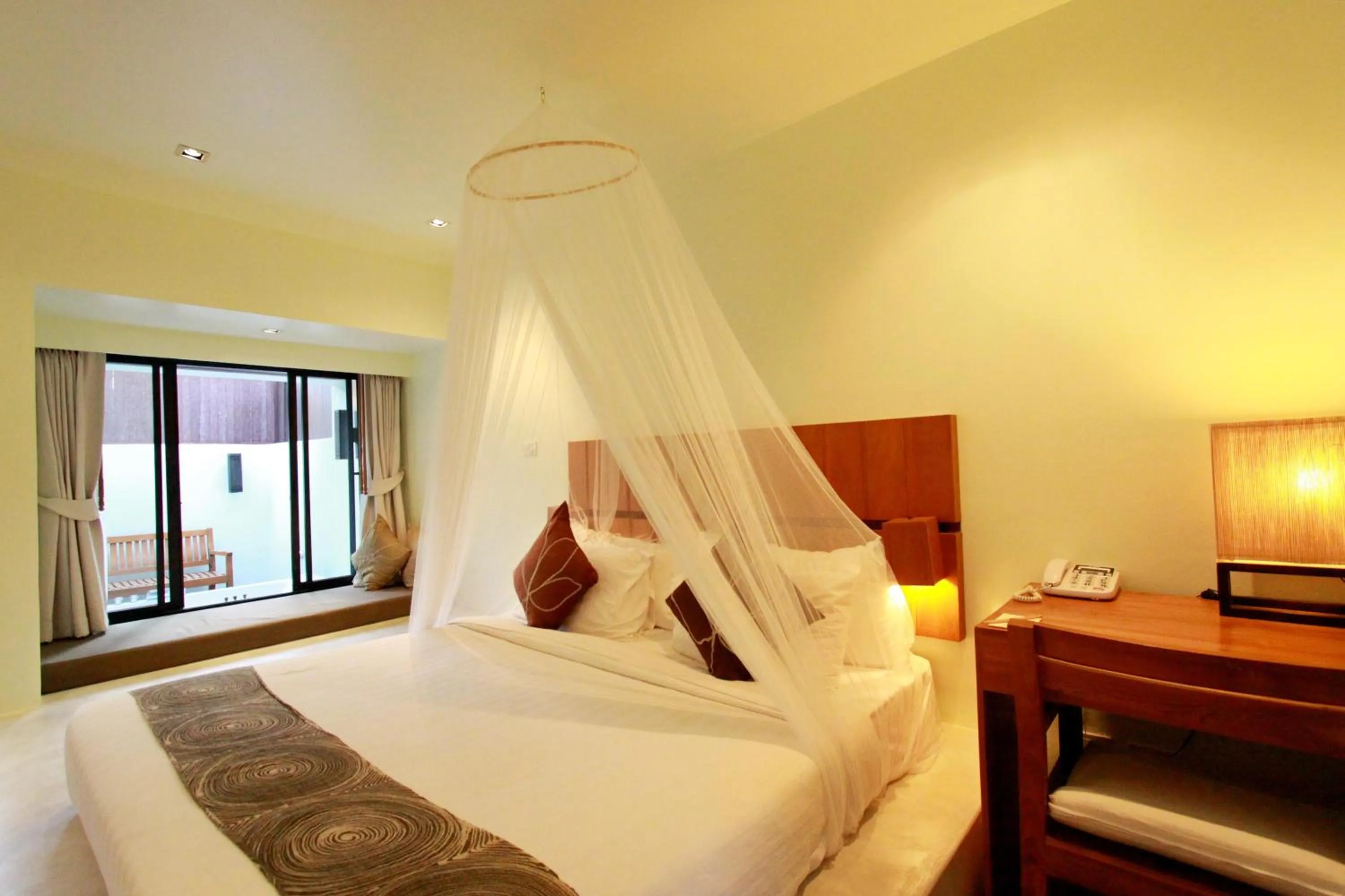 Bed in Mimosa Resort & Spa