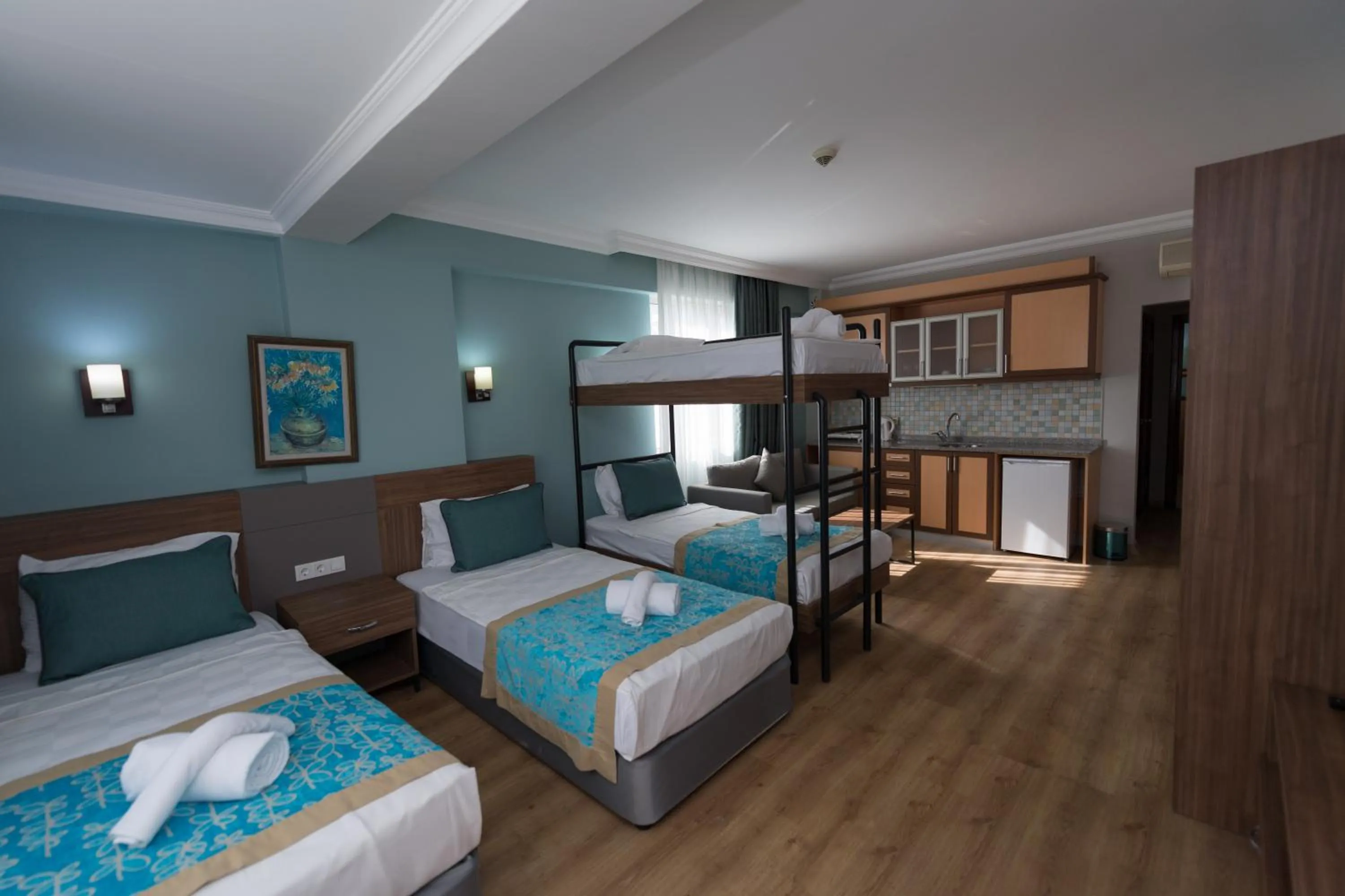 Bed in Side Village Family Suite - All Inclusive