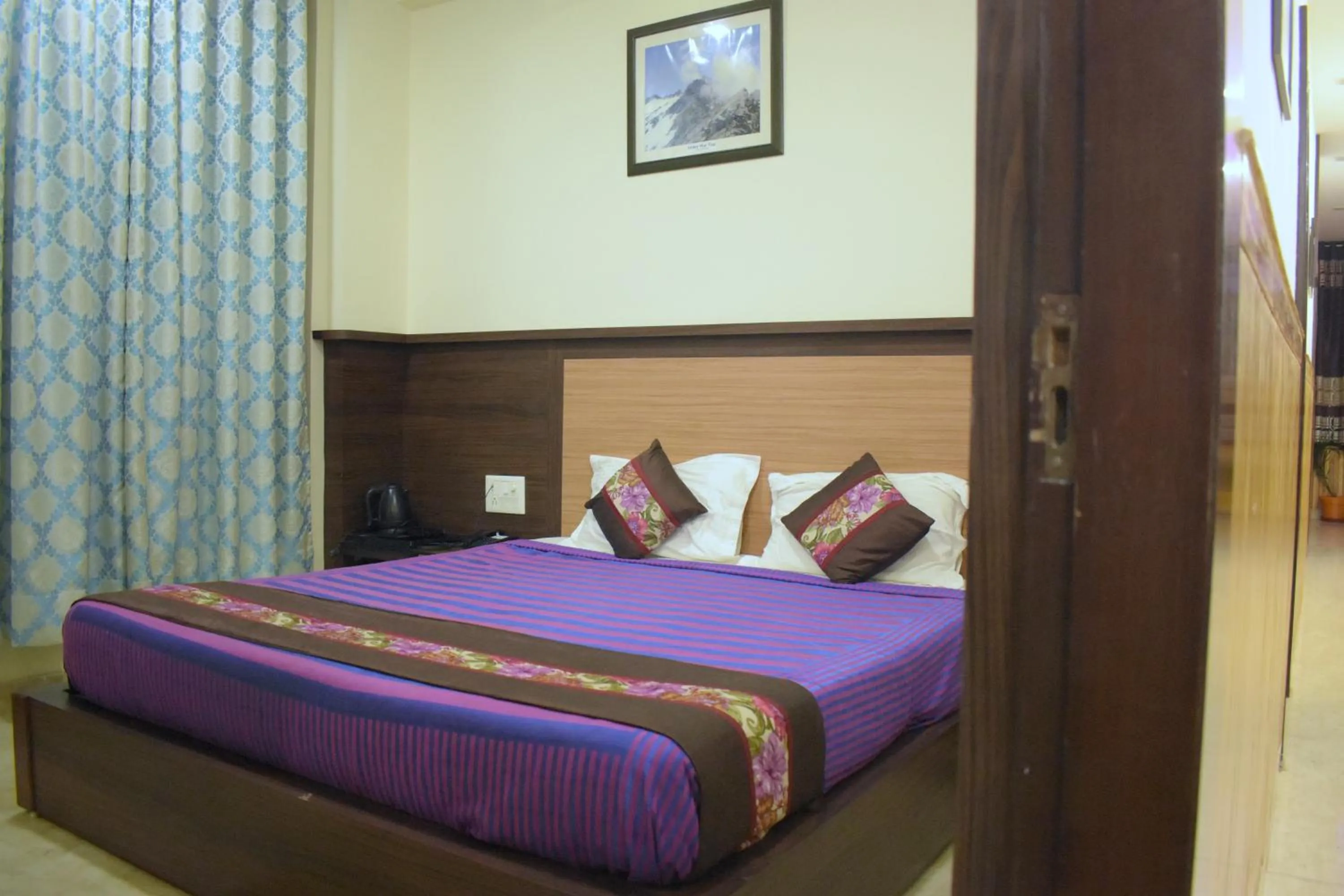 Bed in Hotel Nature's View