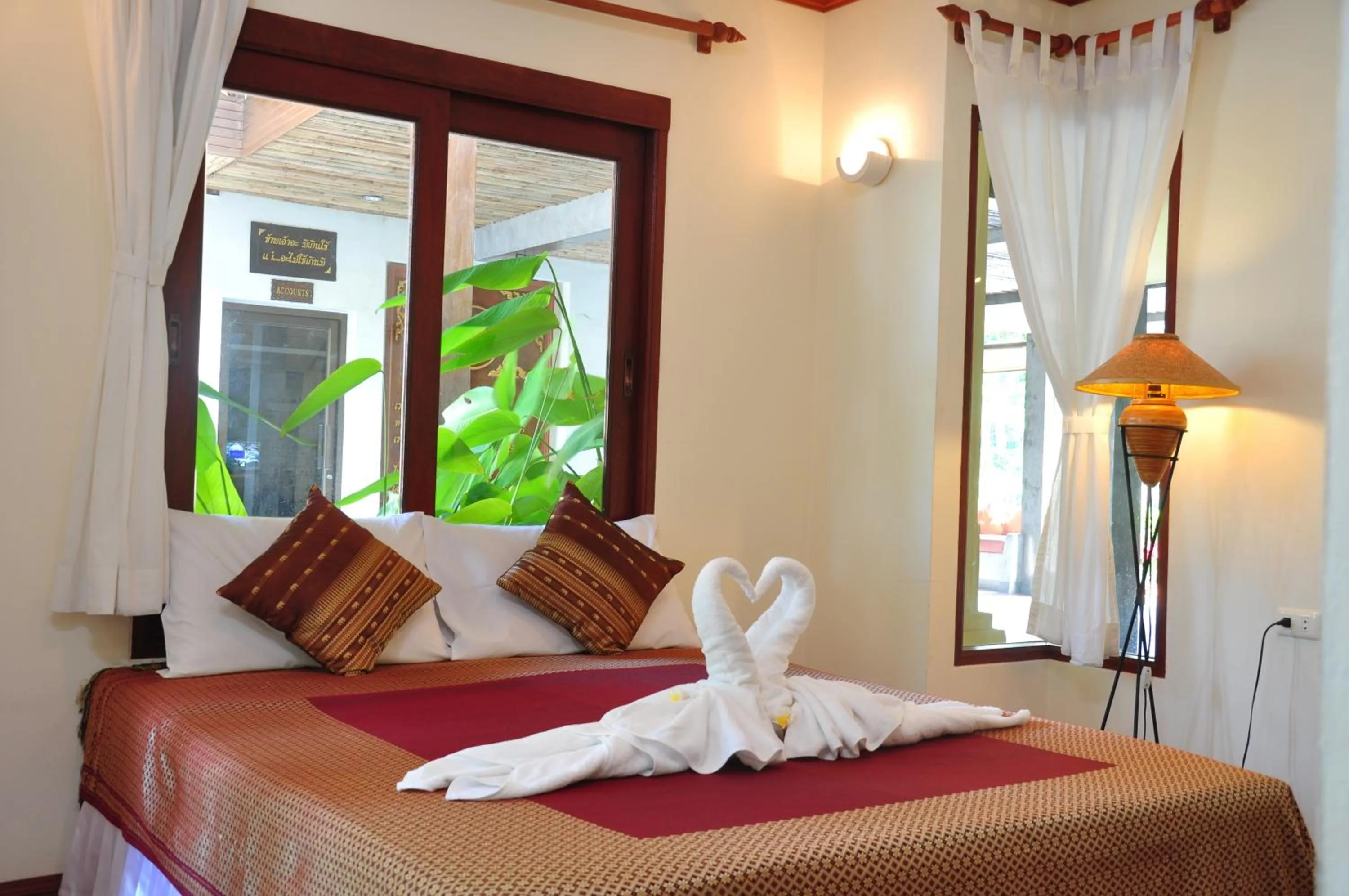 Bed in Samui Honey Cottages Beach Resort - SHA Extra Plus