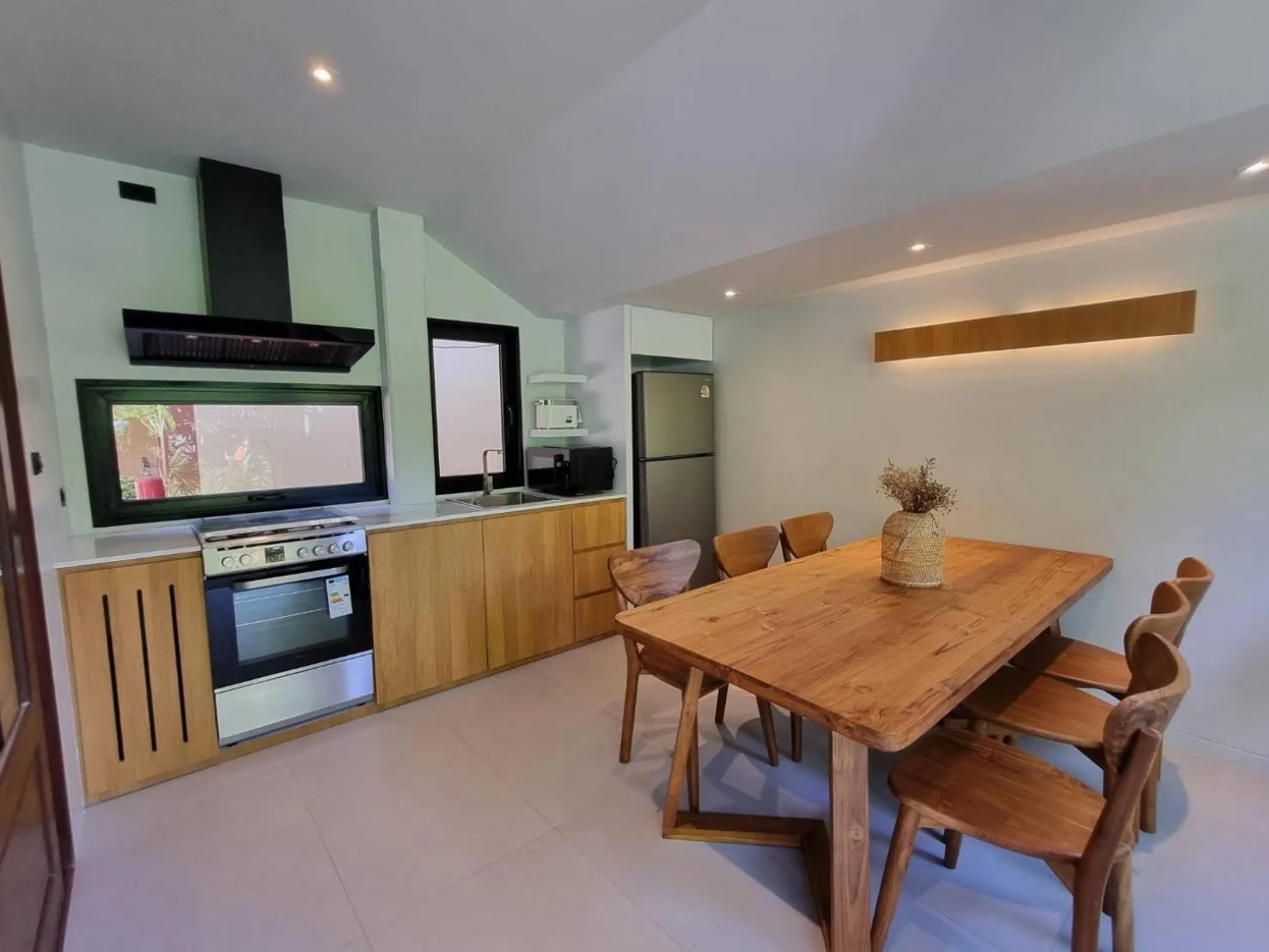 Kitchen or kitchenette in Samui Honey Cottages Beach Resort - SHA Extra Plus