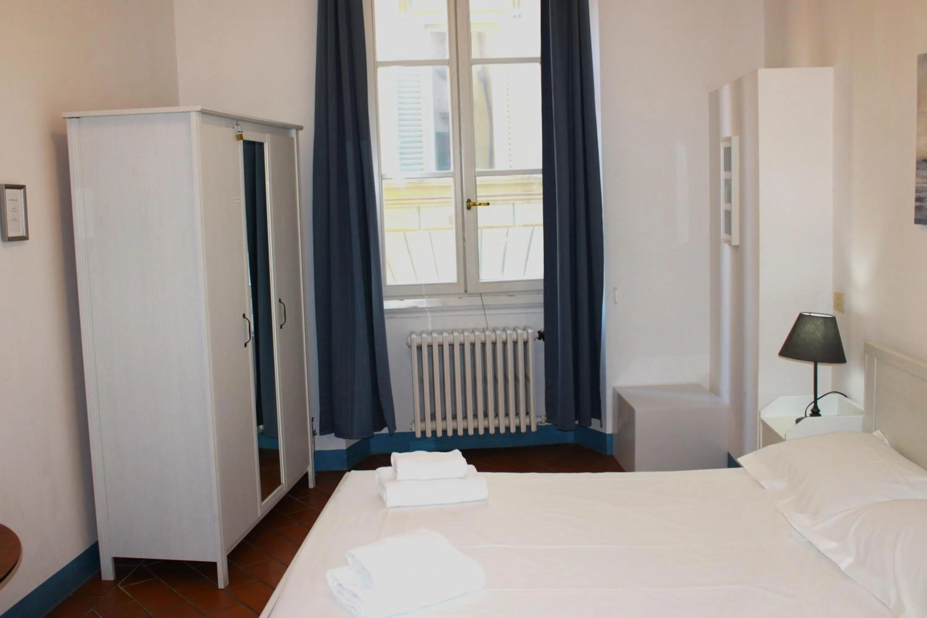 Bed in Michelangelo's Relais