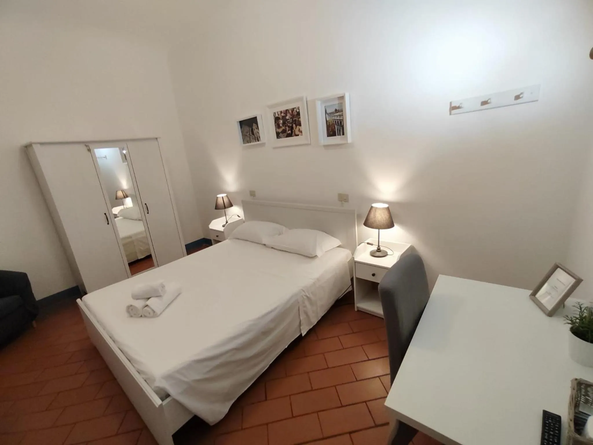 Bed in Michelangelo's Relais