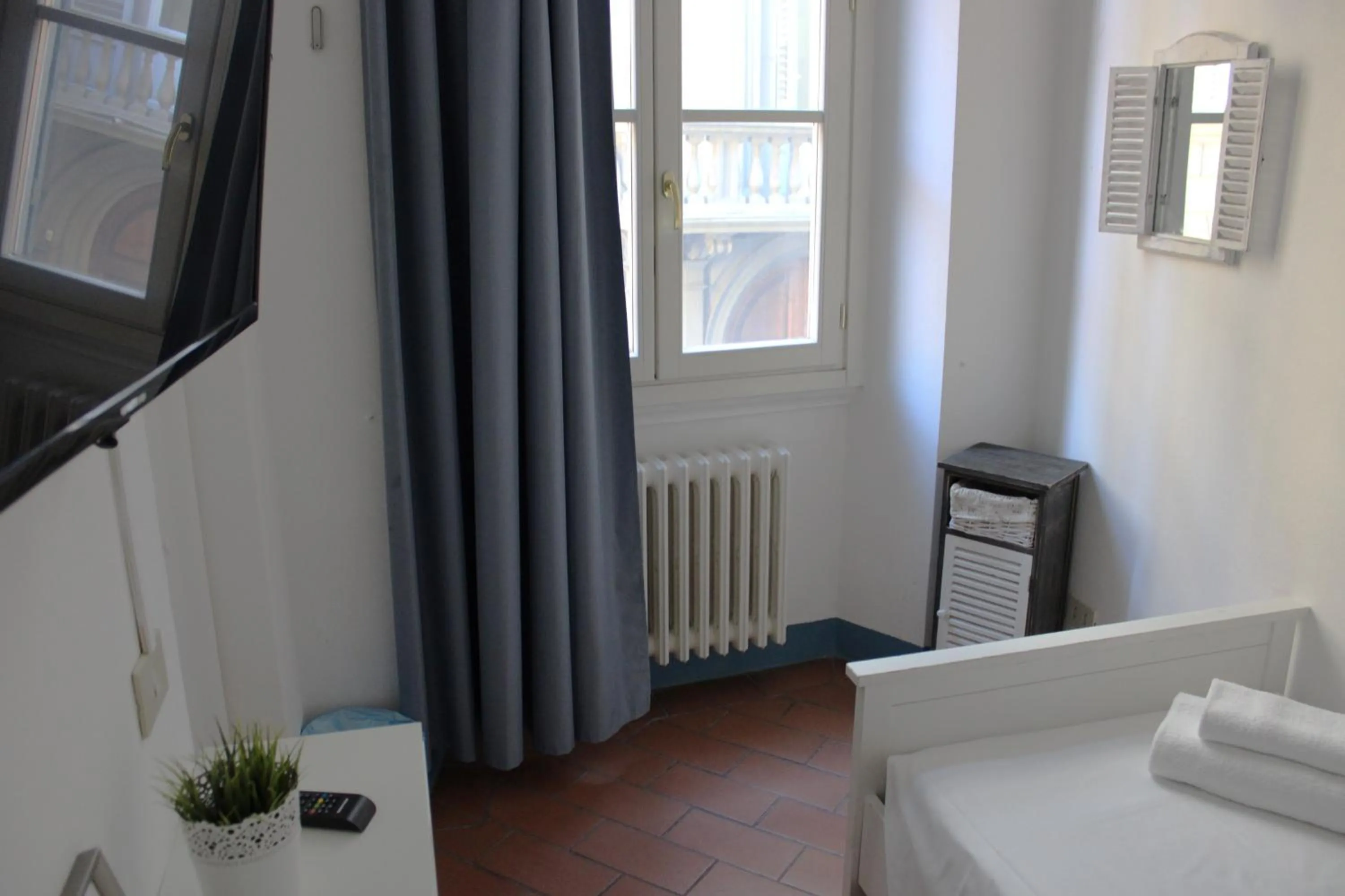 Bed in Michelangelo's Relais