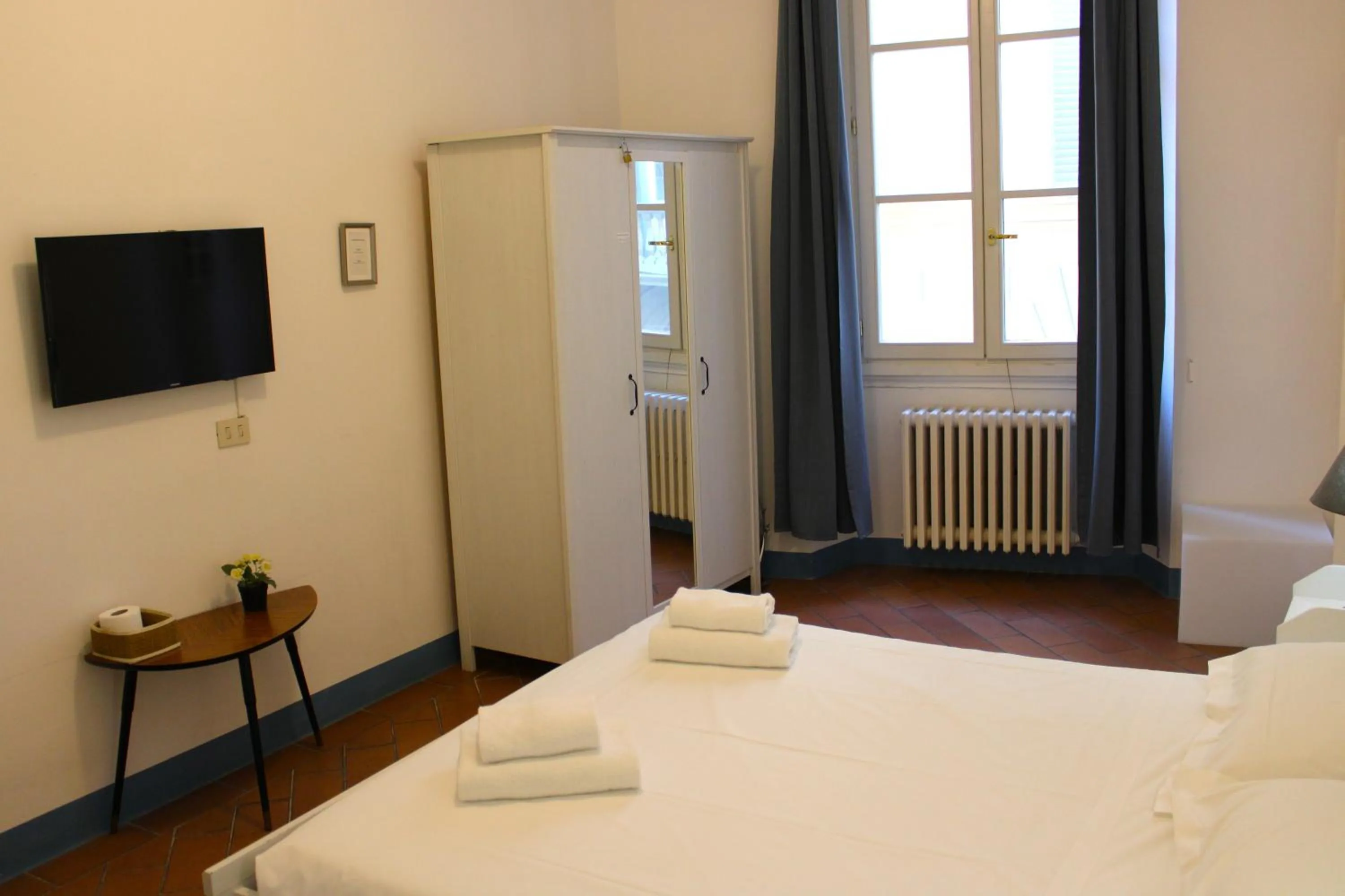 Bed in Michelangelo's Relais