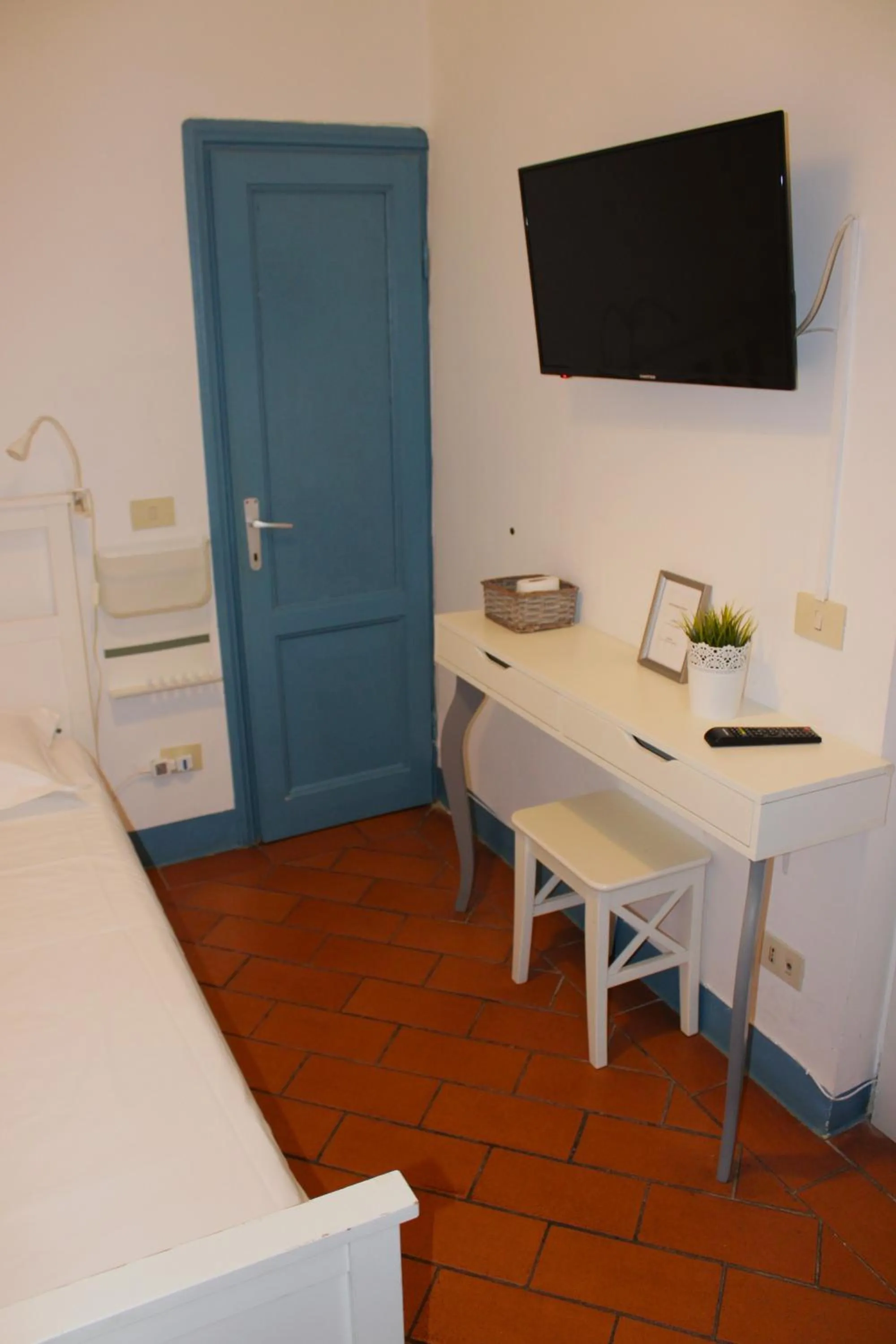 Bed in Michelangelo's Relais