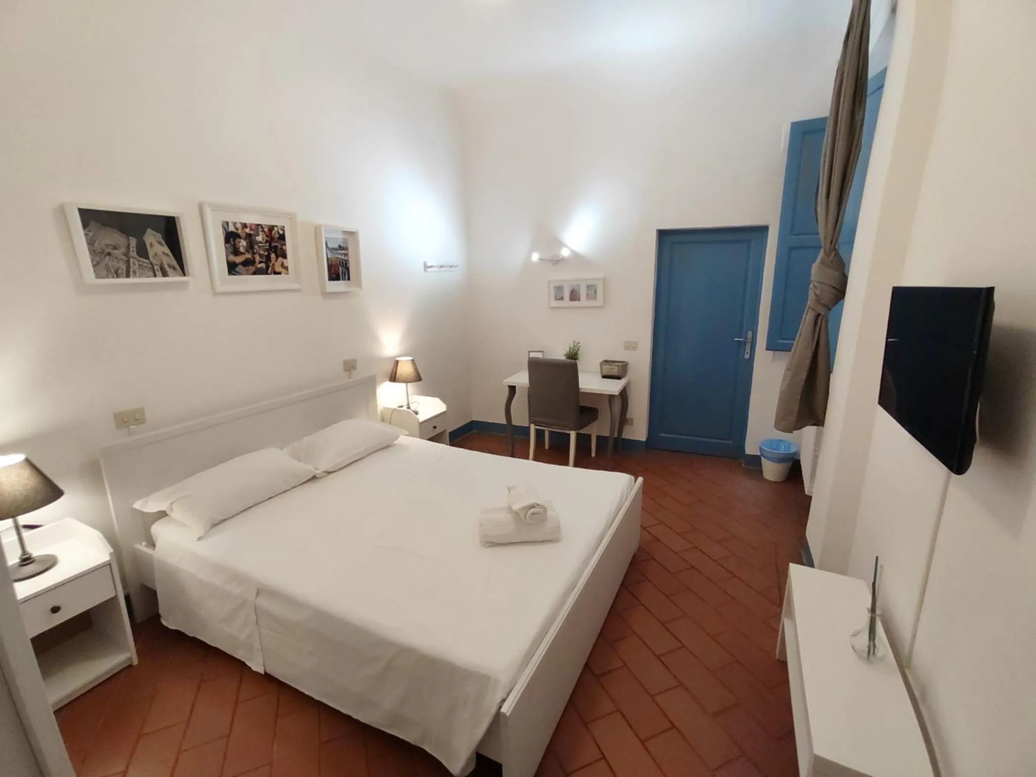 Bed in Michelangelo's Relais
