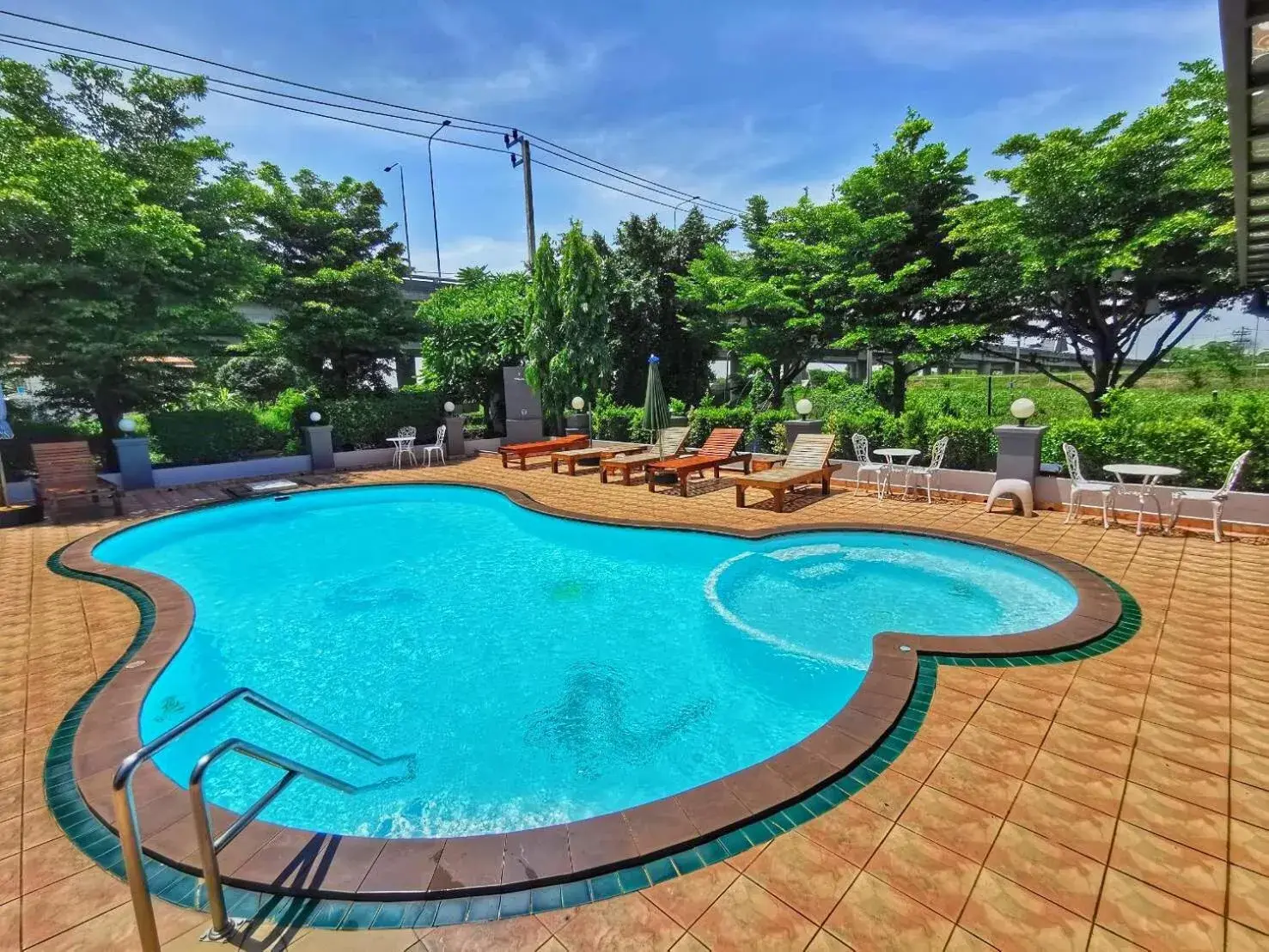 Pool view in The Great Residence Suvarnabhumi Airport Pool view in The Great Residence Suvarnabhumi Airport