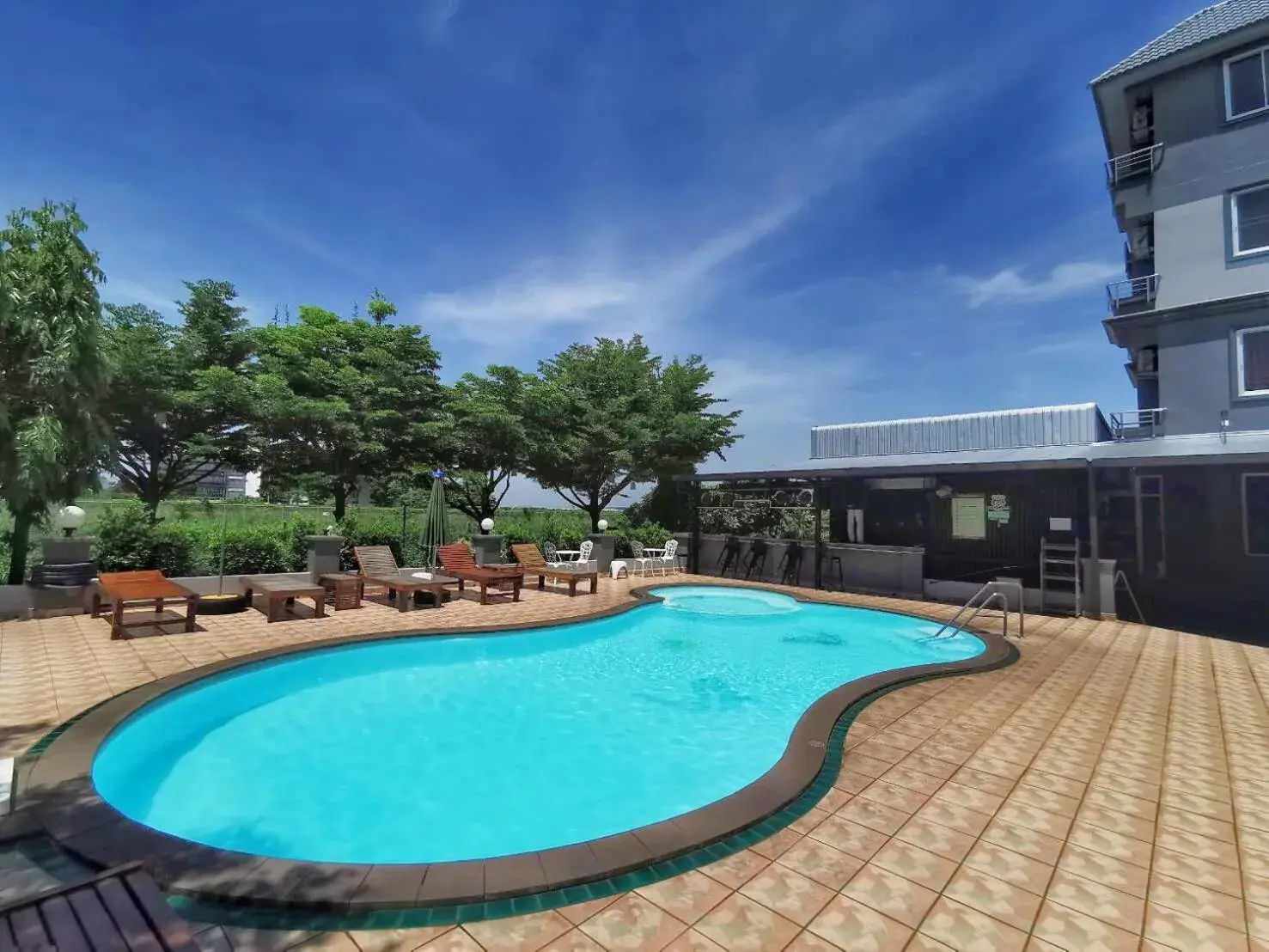 Pool view in The Great Residence Suvarnabhumi Airport Pool view in The Great Residence Suvarnabhumi Airport