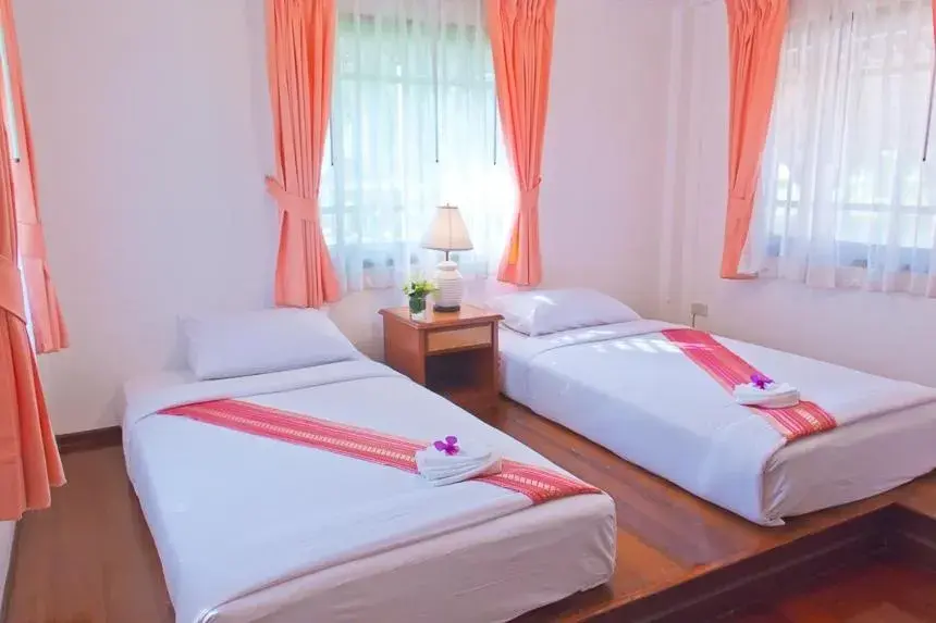 Bed in Supalai Pasak Resort Hotel And Spa Bed in Supalai Pasak Resort Hotel And Spa