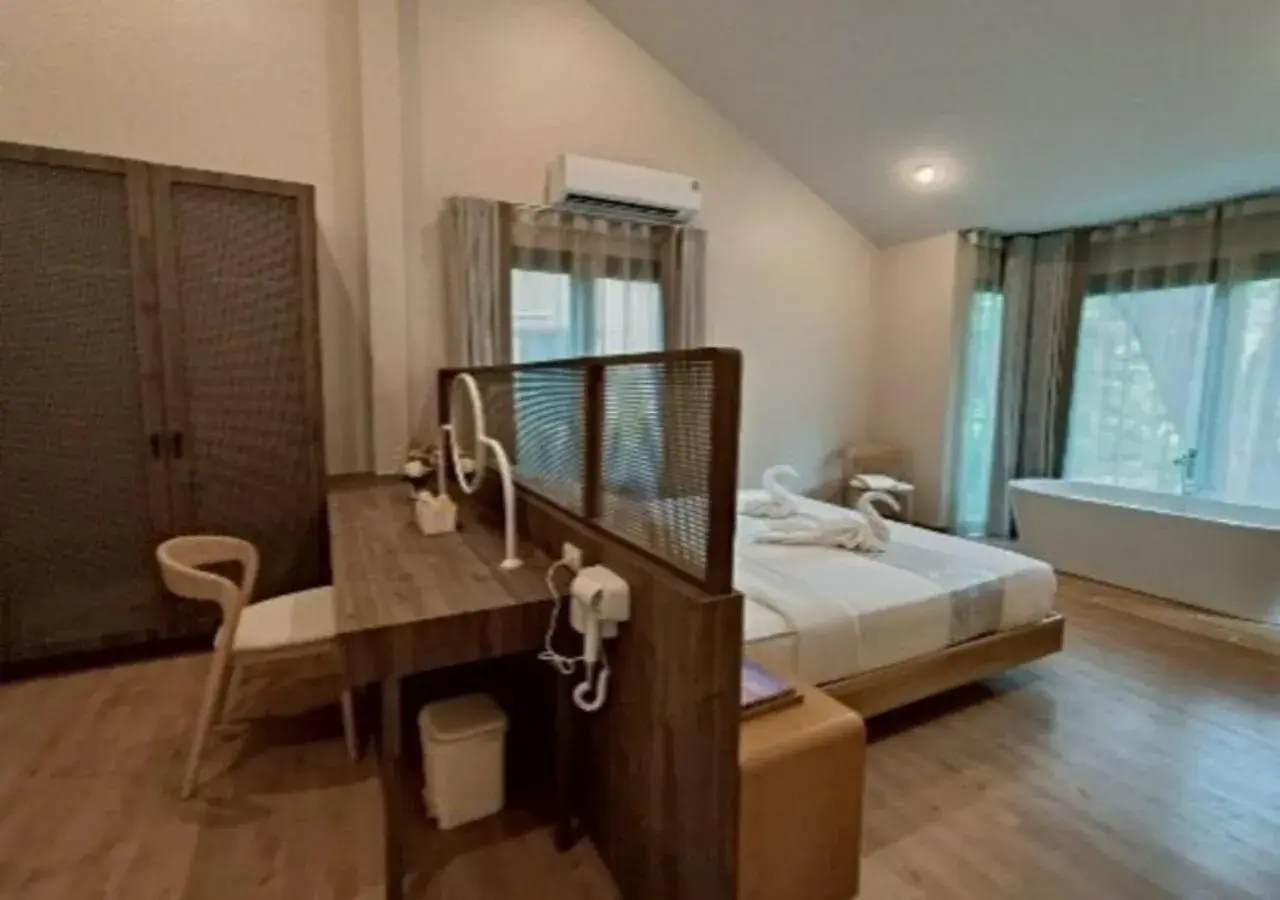 Bed in Supalai Pasak Resort Hotel And Spa Bed in Supalai Pasak Resort Hotel And Spa