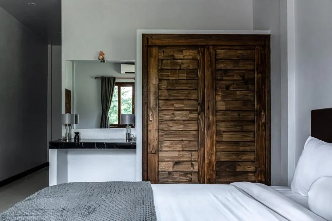 wardrobe, Bed in Anahata Resort