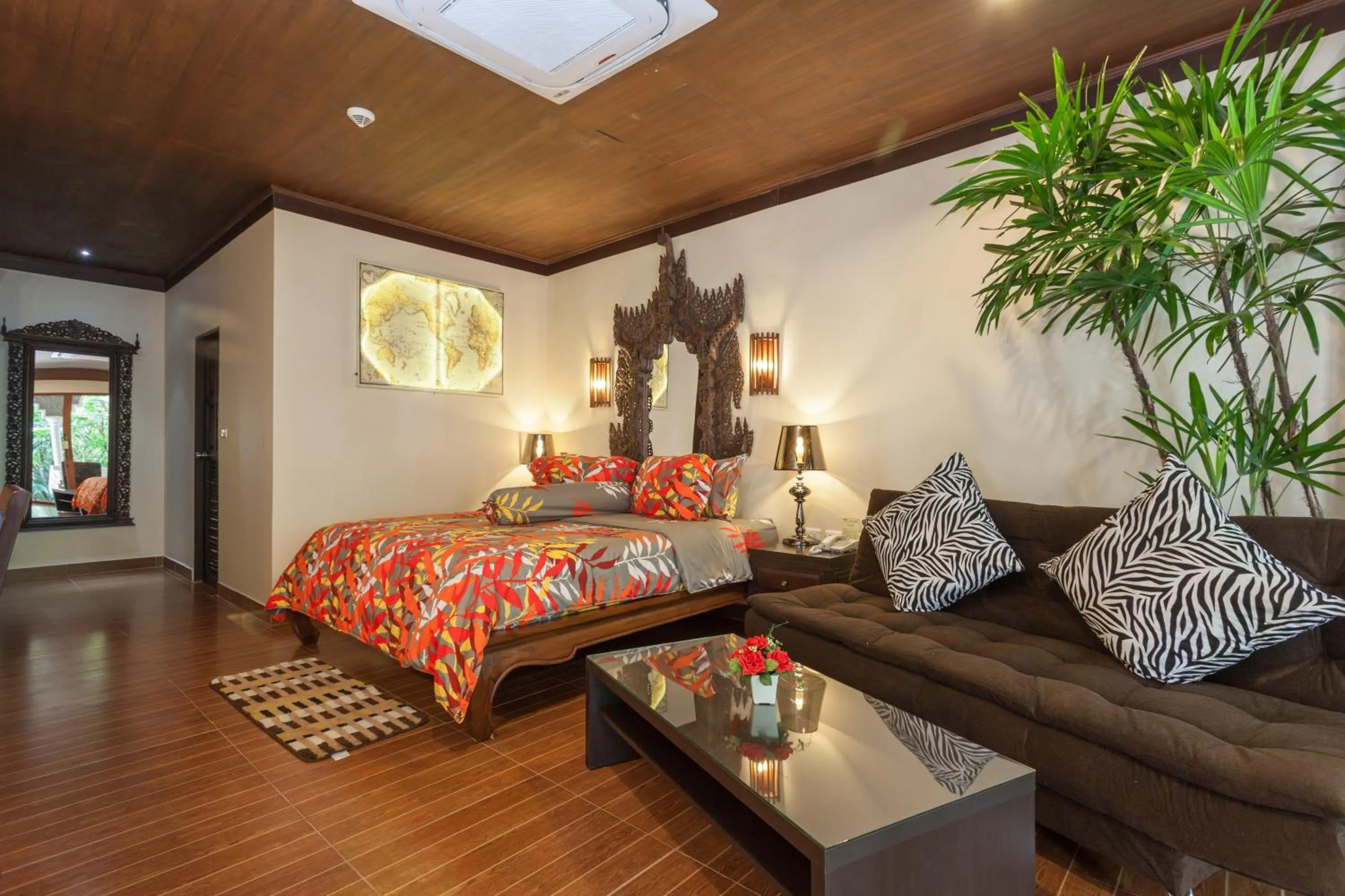 Bed in Tropica Bungalow Beach Hotel