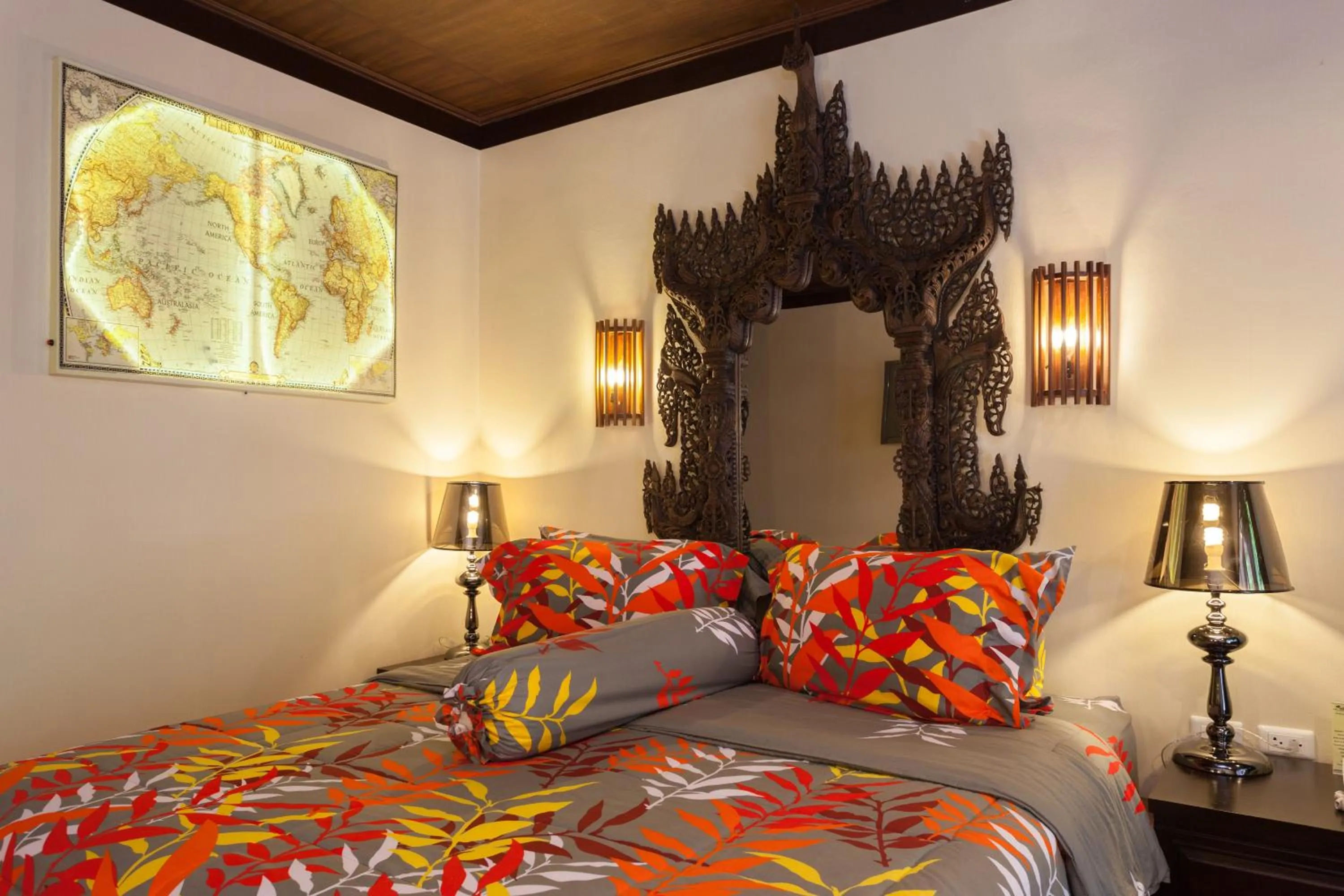 Bed in Tropica Bungalow Beach Hotel