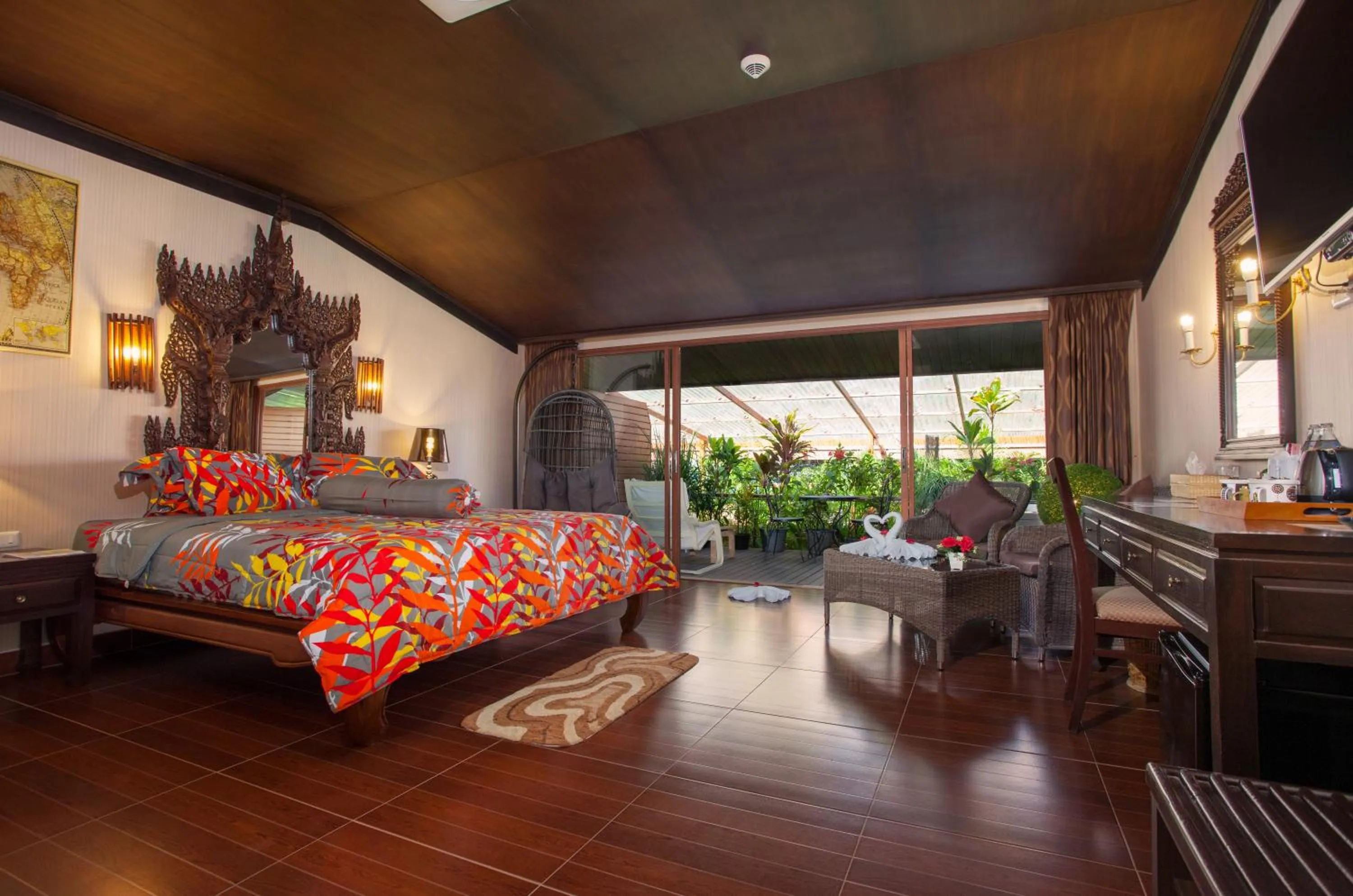 Bed in Tropica Bungalow Beach Hotel