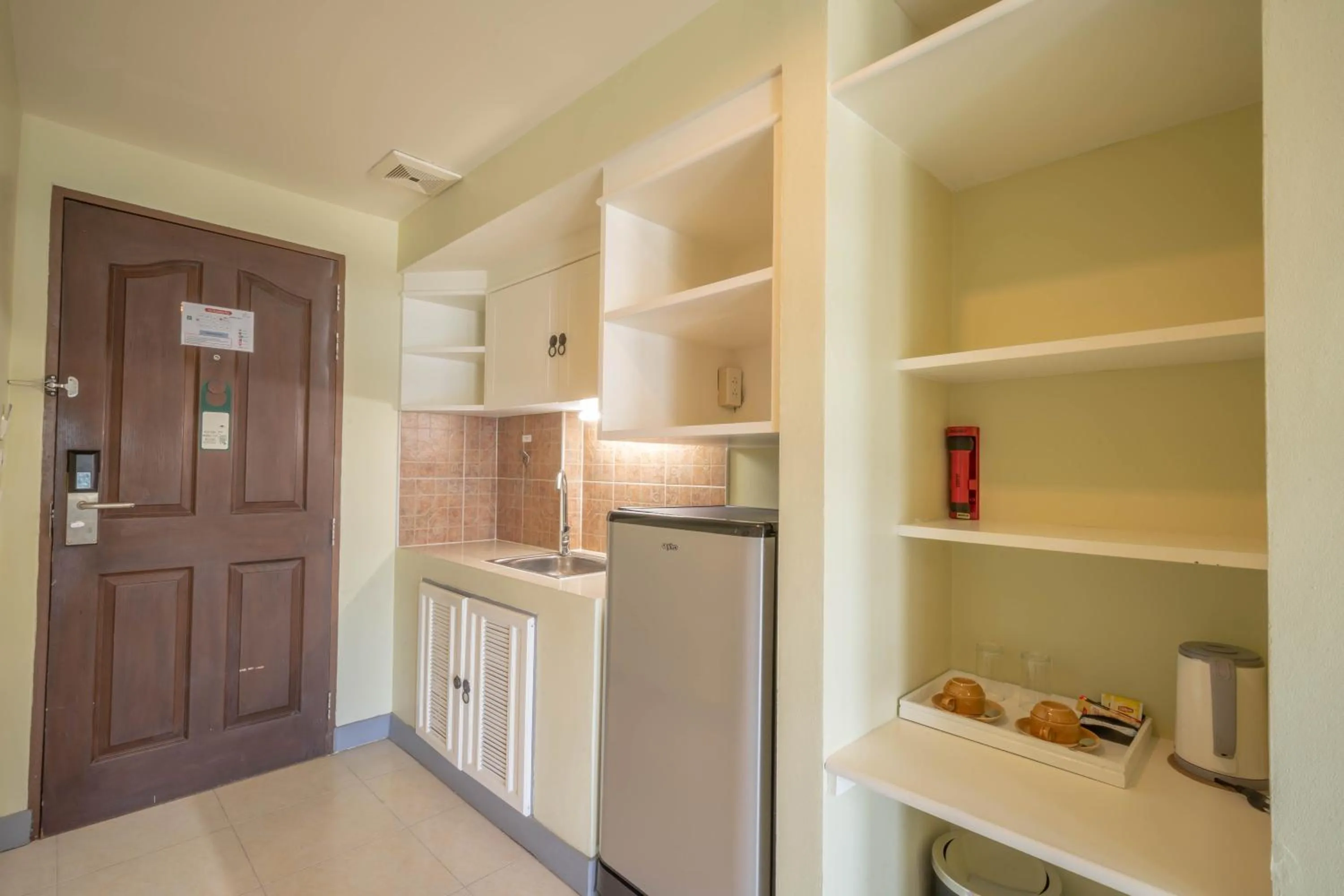 Kitchen or kitchenette in La Vintage Resort - Patong, Phuket