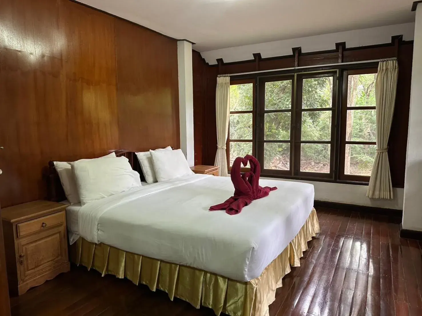 Bed in The Legacy River Kwai Resort Bed in The Legacy River Kwai Resort