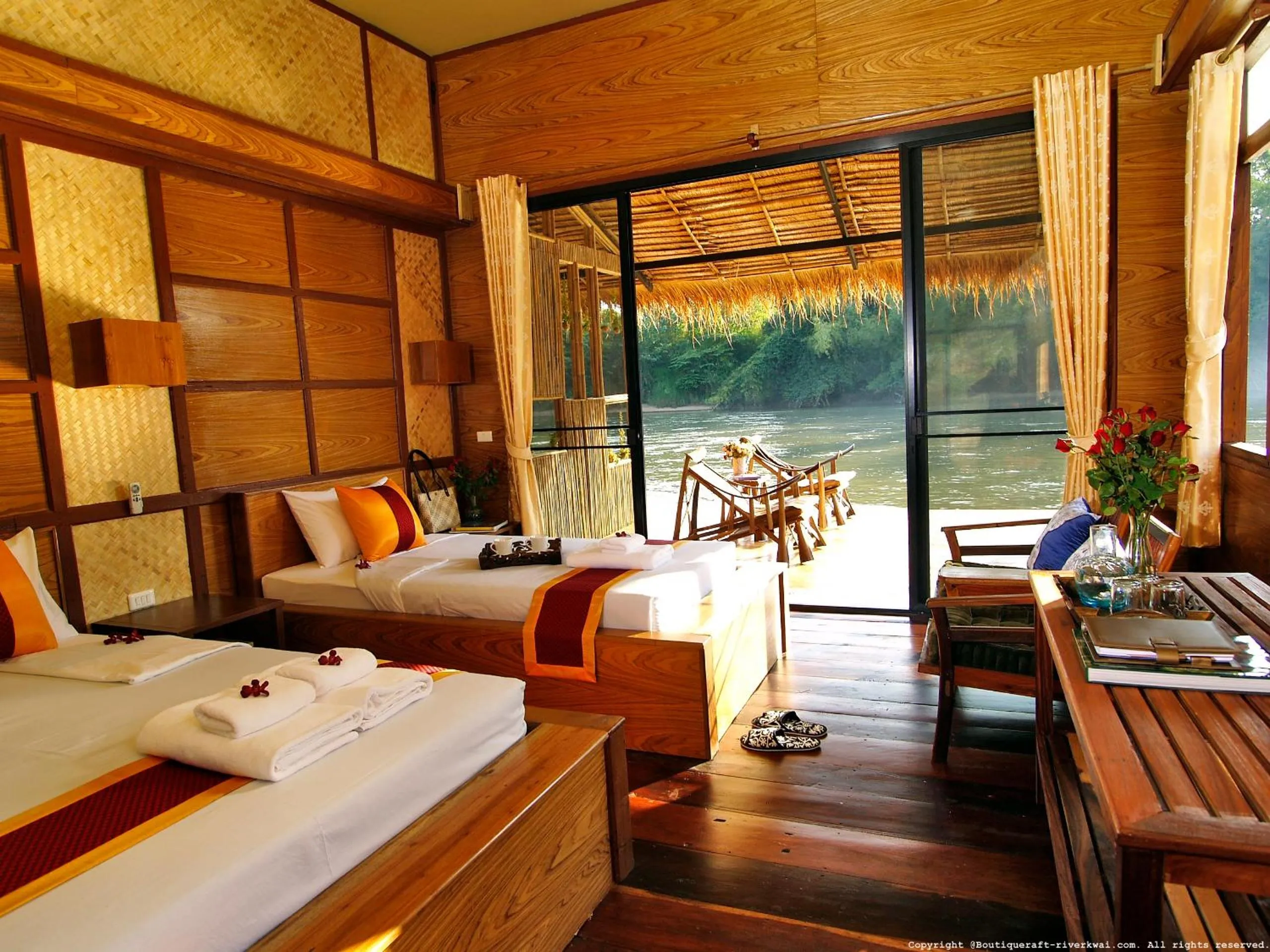 Bed in Boutique Raft Resort, River Kwai