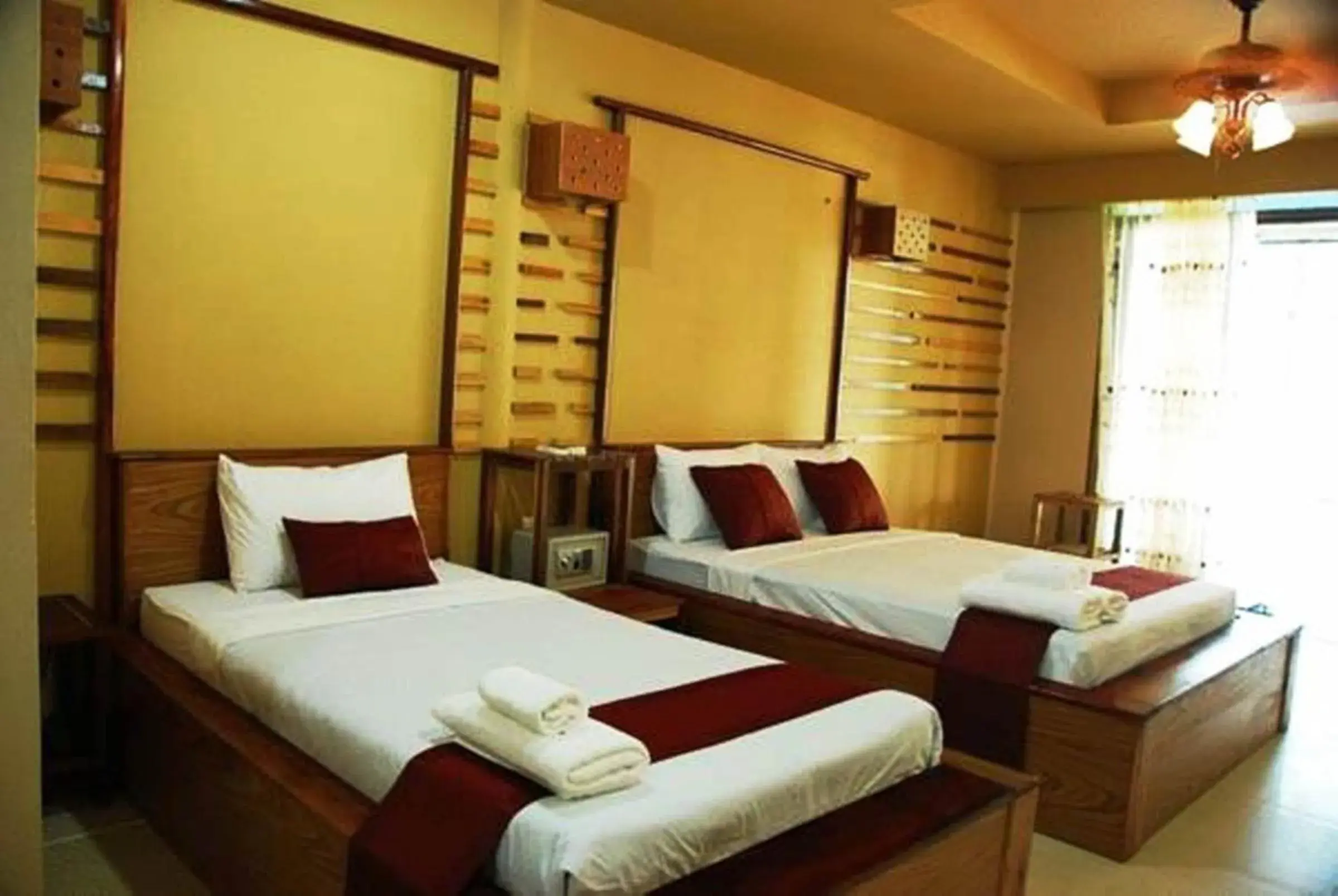 Bed in Boutique Raft Resort, River Kwai Bed in Boutique Raft Resort, River Kwai