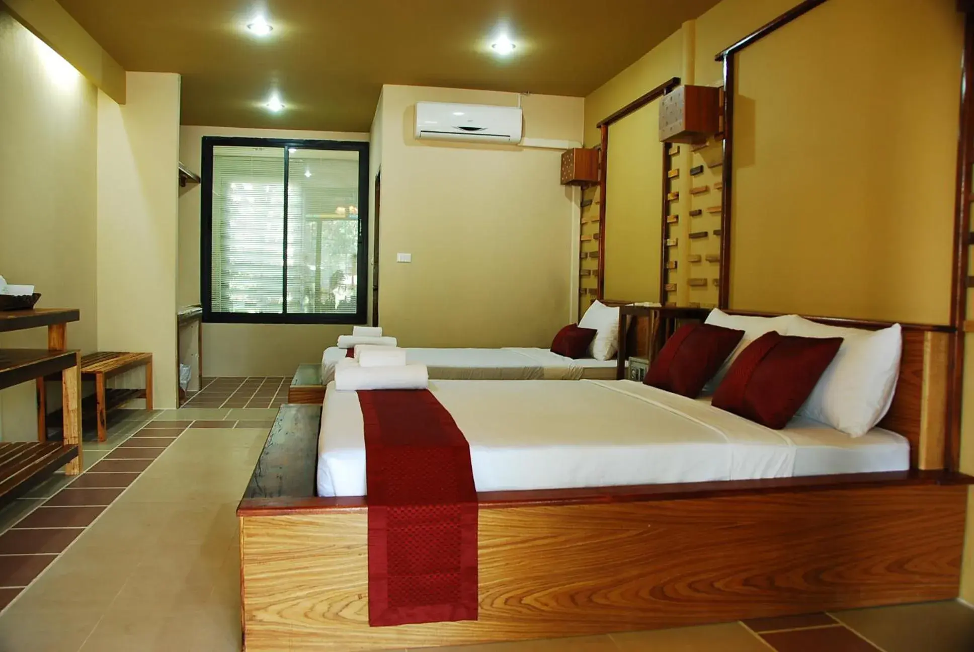 Bed in Boutique Raft Resort, River Kwai Bed in Boutique Raft Resort, River Kwai