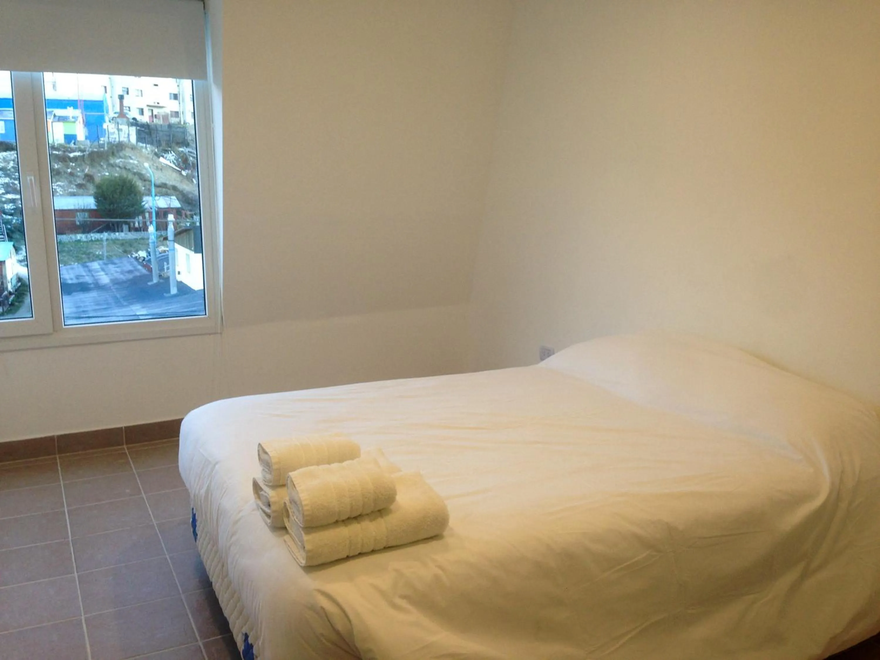 Bed in Patagonia Austral Apartamentos