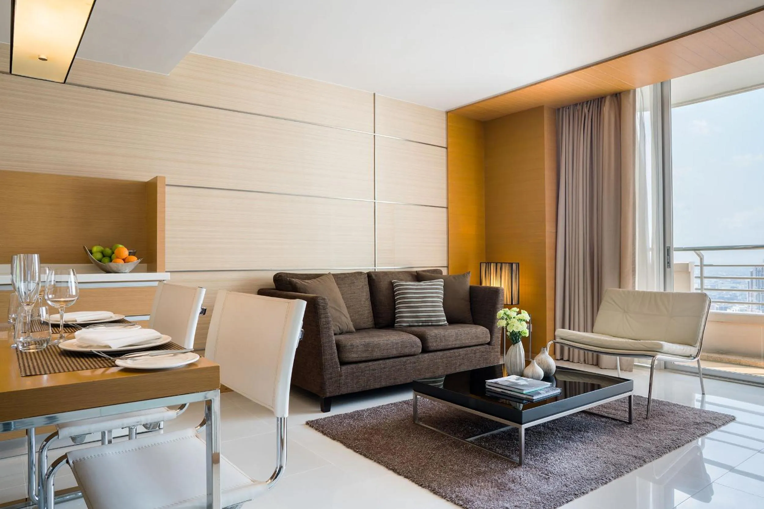 Living room in JC Kevin Sathorn Bangkok Hotel