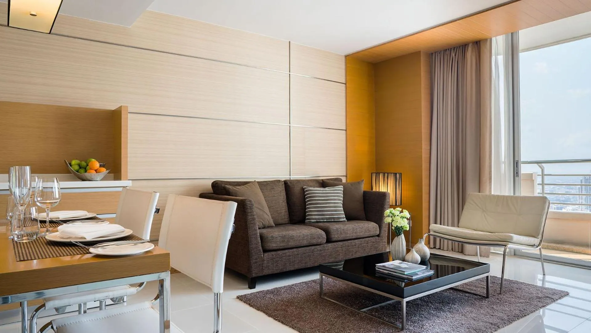 Living room in JC Kevin Sathorn Bangkok Hotel