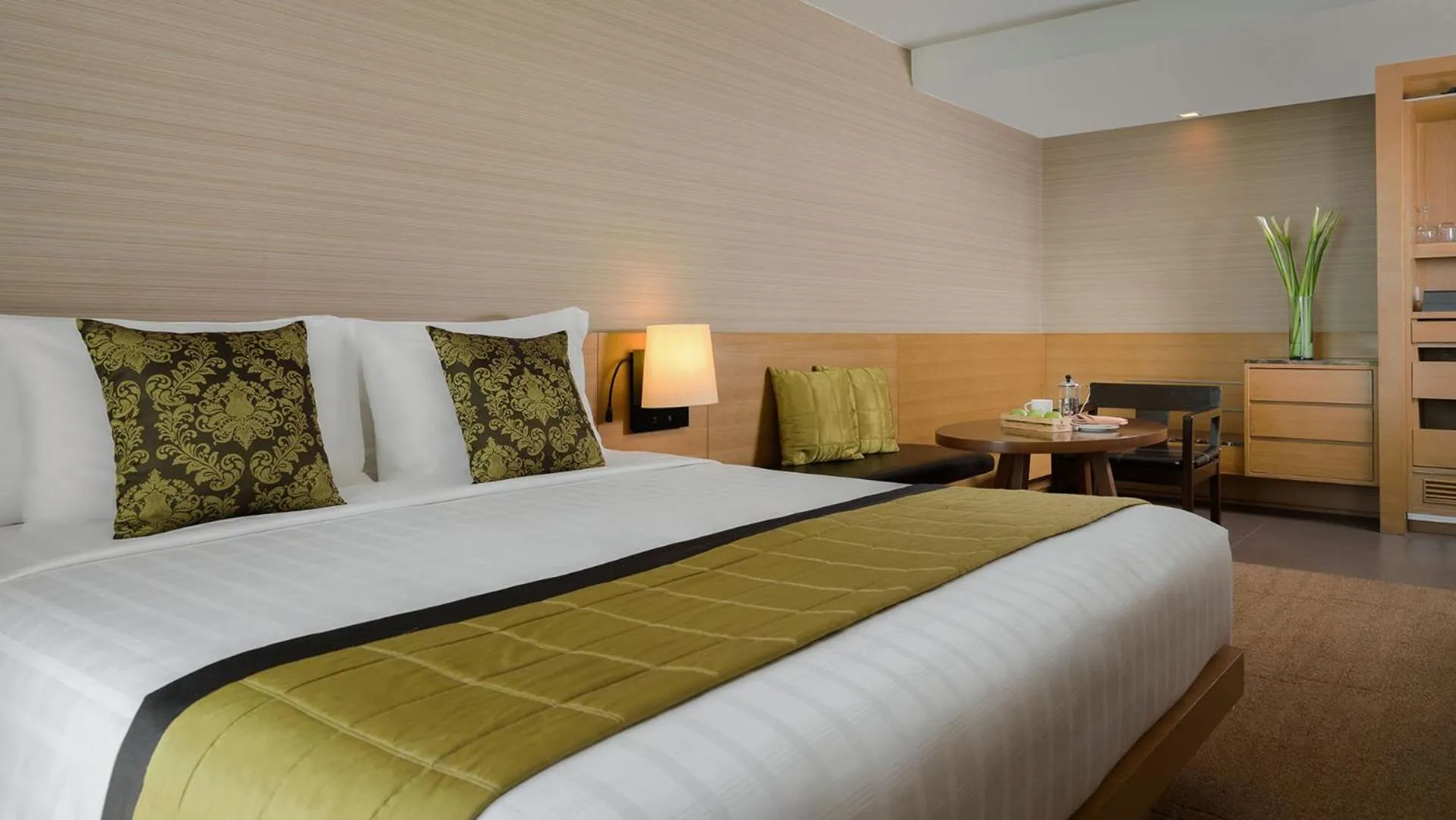 Bed in JC Kevin Sathorn Bangkok Hotel