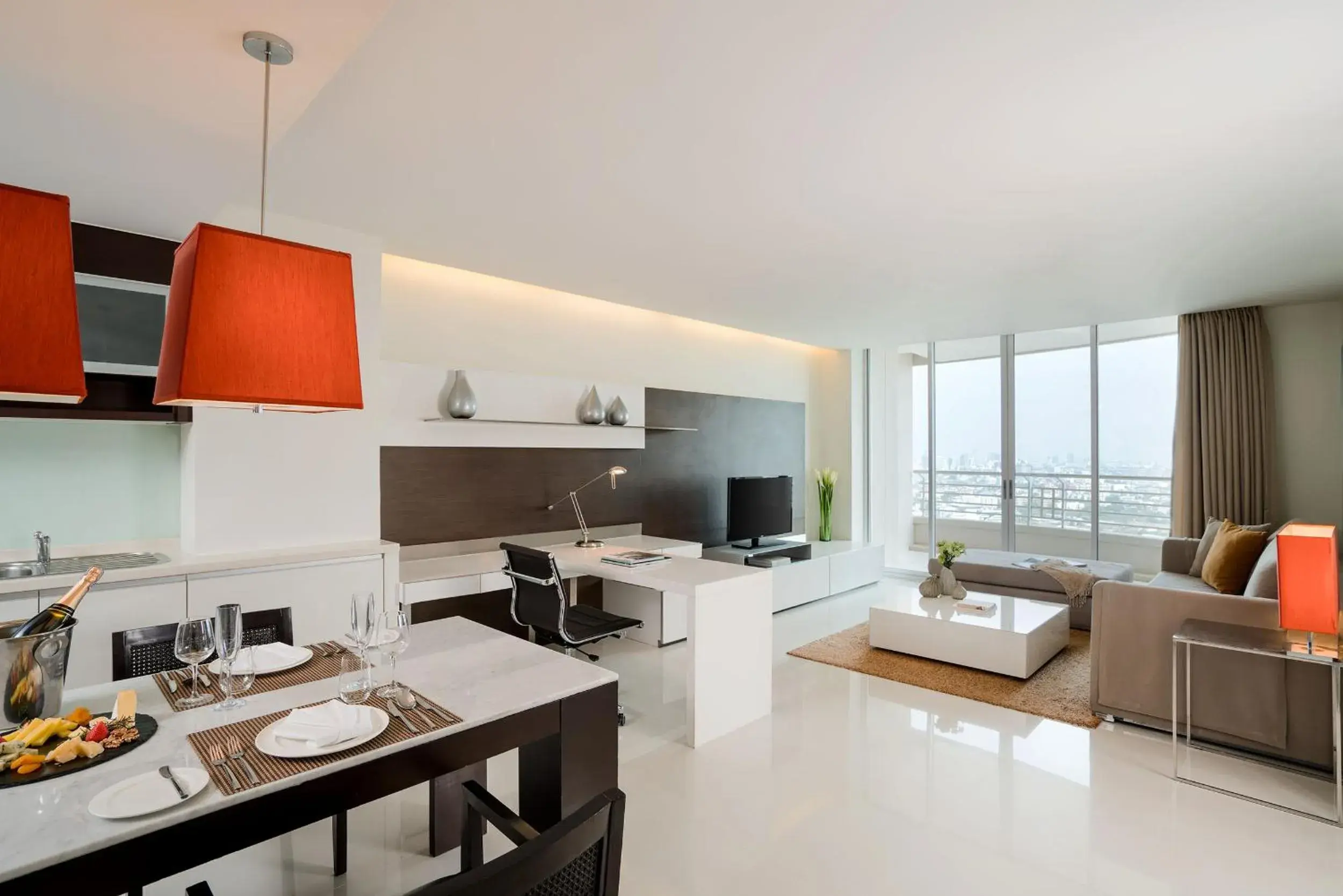 Living room in JC Kevin Sathorn Bangkok Hotel Living room in JC Kevin Sathorn Bangkok Hotel