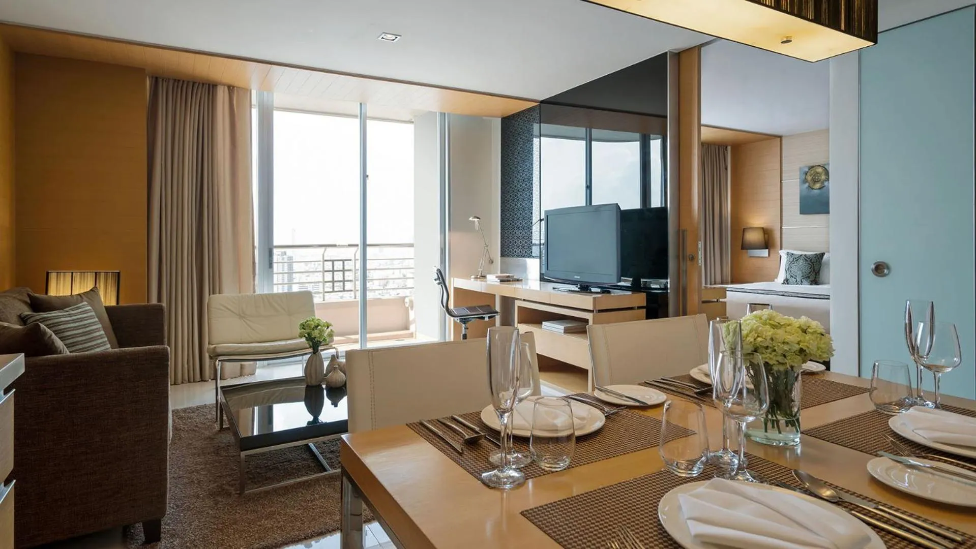 Living room in JC Kevin Sathorn Bangkok Hotel