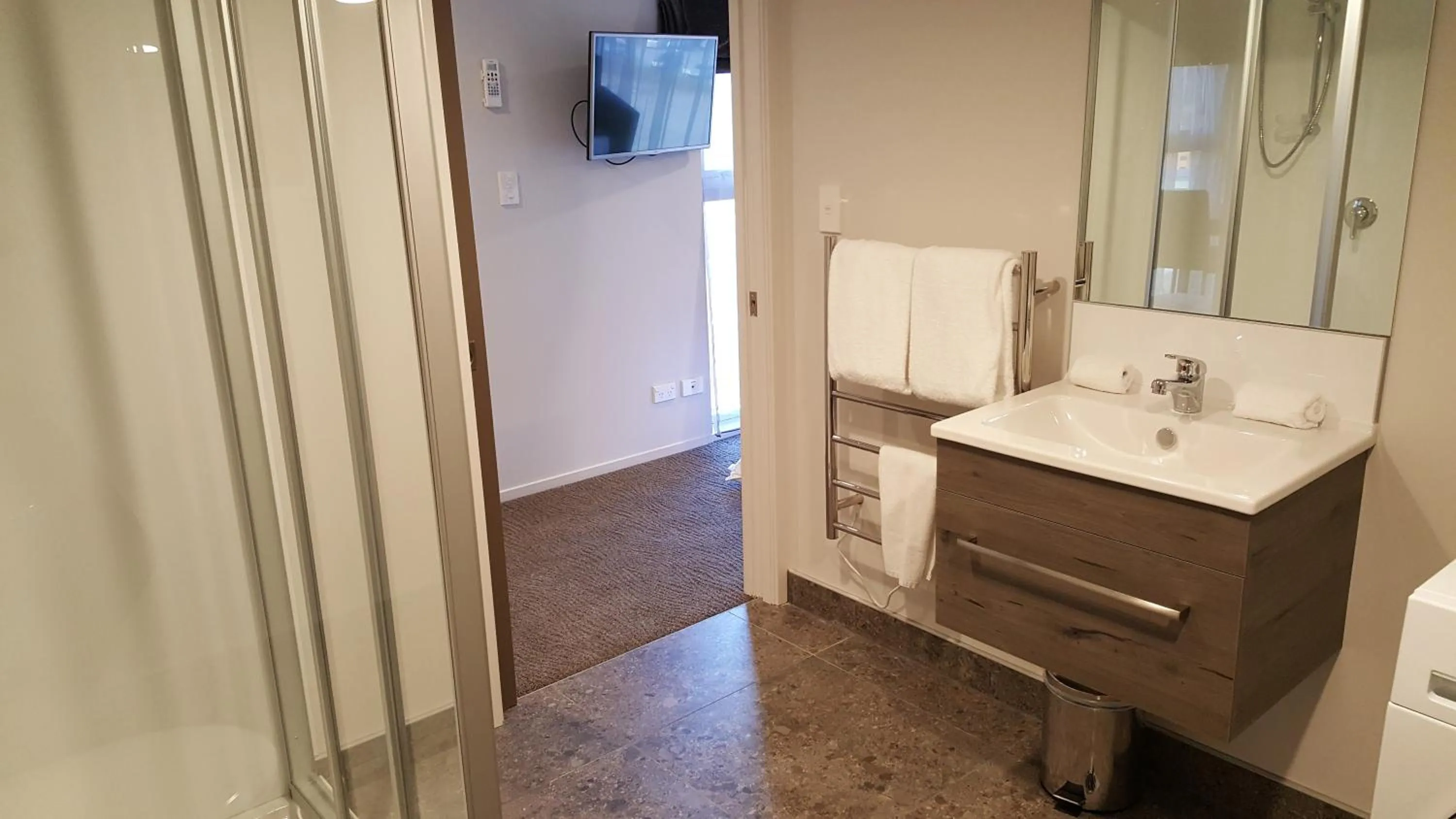 Bathroom in Ramada Suites by Wyndham Queenstown Remarkables Park