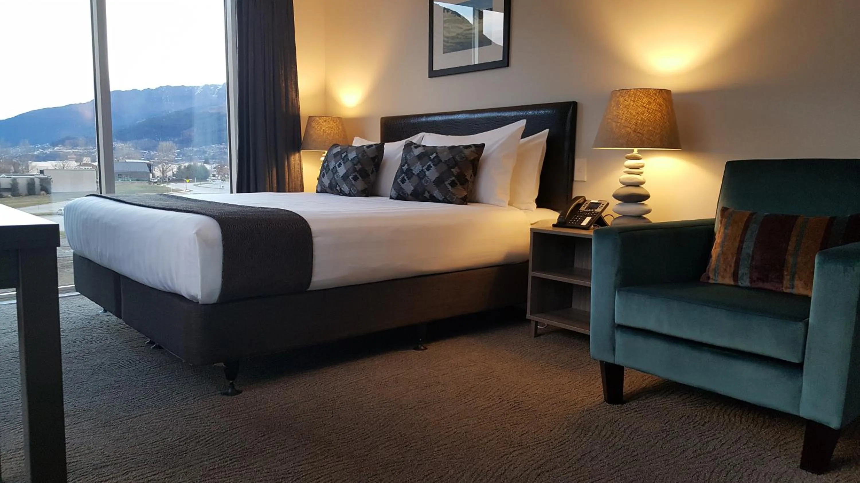 Photo of the whole room, Bed in Ramada Suites by Wyndham Queenstown Remarkables Park