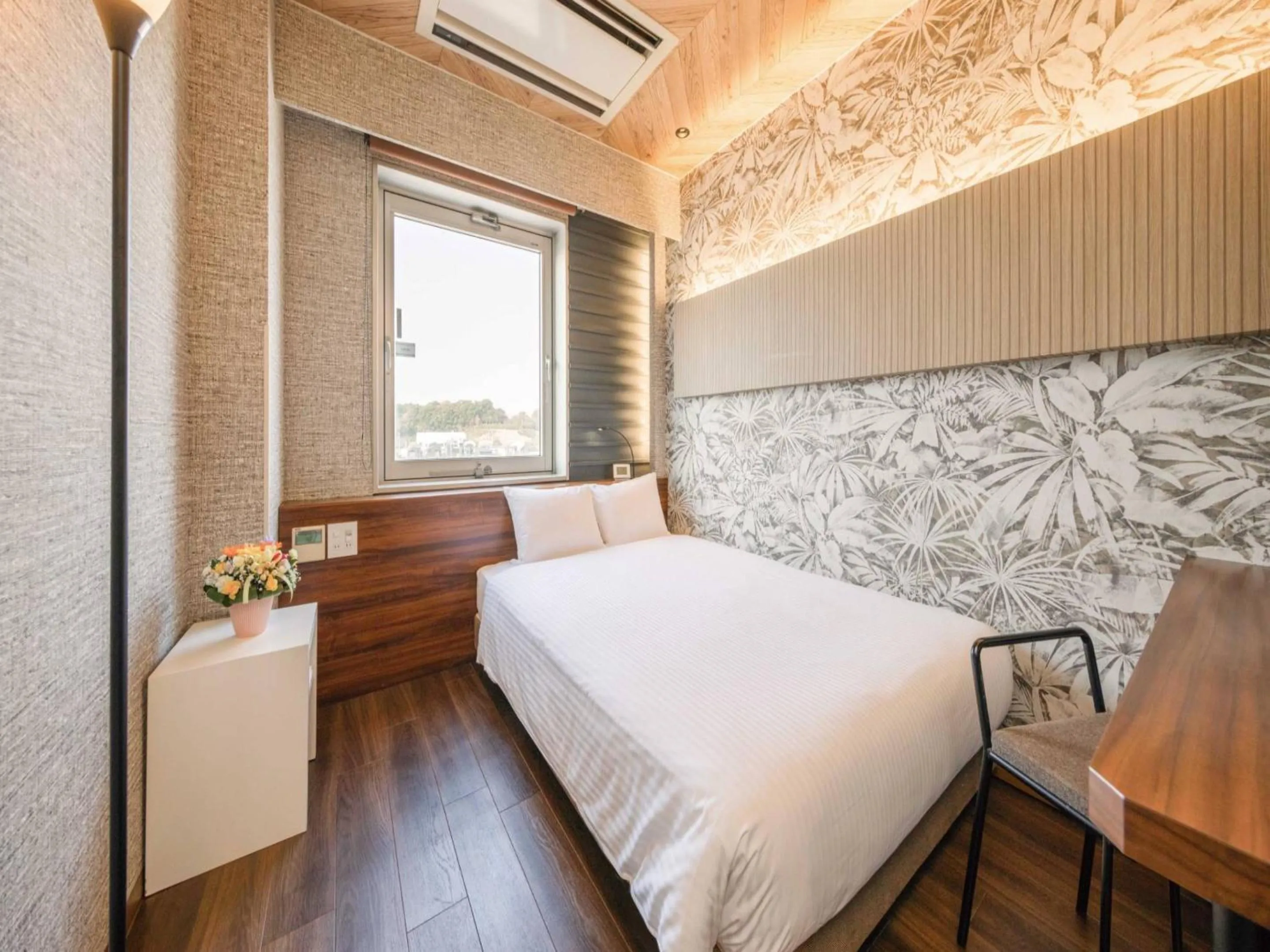 Photo of the whole room, Bed in Tokai City Hotel